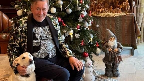 Richard Lugner mit seinem "treuesten Tierchen", Schäfer "Michi".