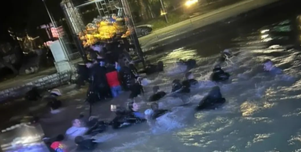 Einige Party-Gäste sprangen in Panik ins eiskalte Wasser.