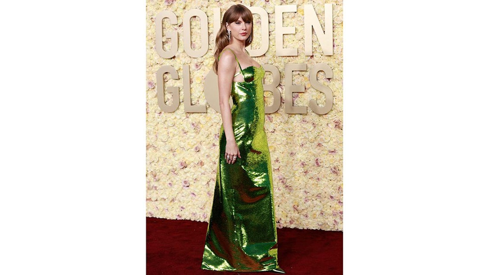 Taylor Swift sorgte im grünen Paillettenkleid von Gucci für Blitzlichtgewitter.