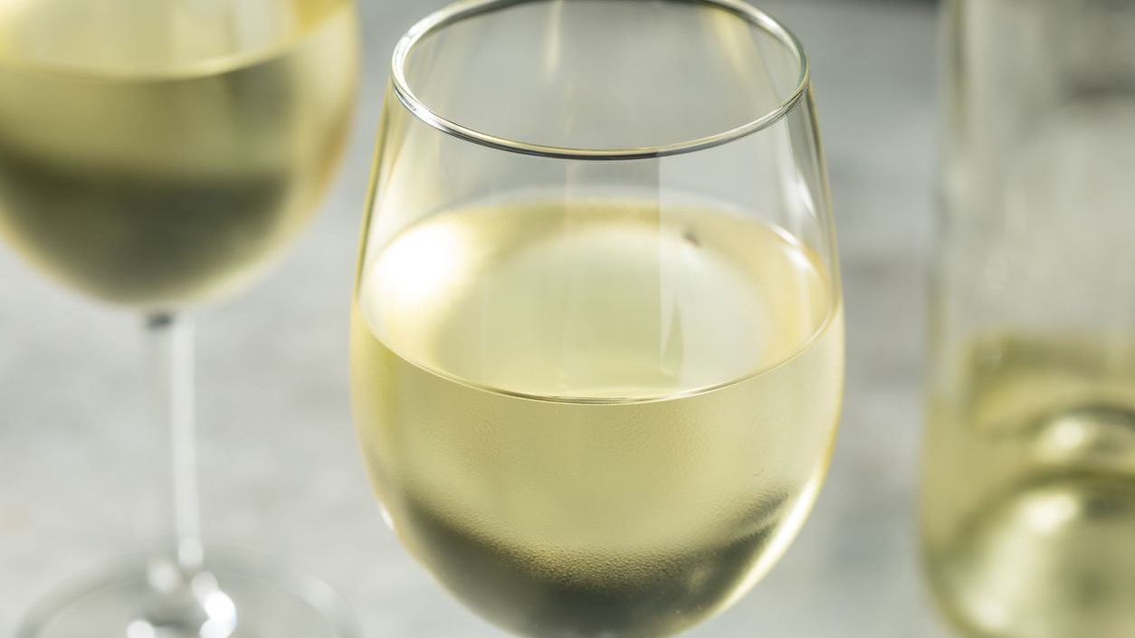 Boozy Organic Sauvignon White Wine in a Glass