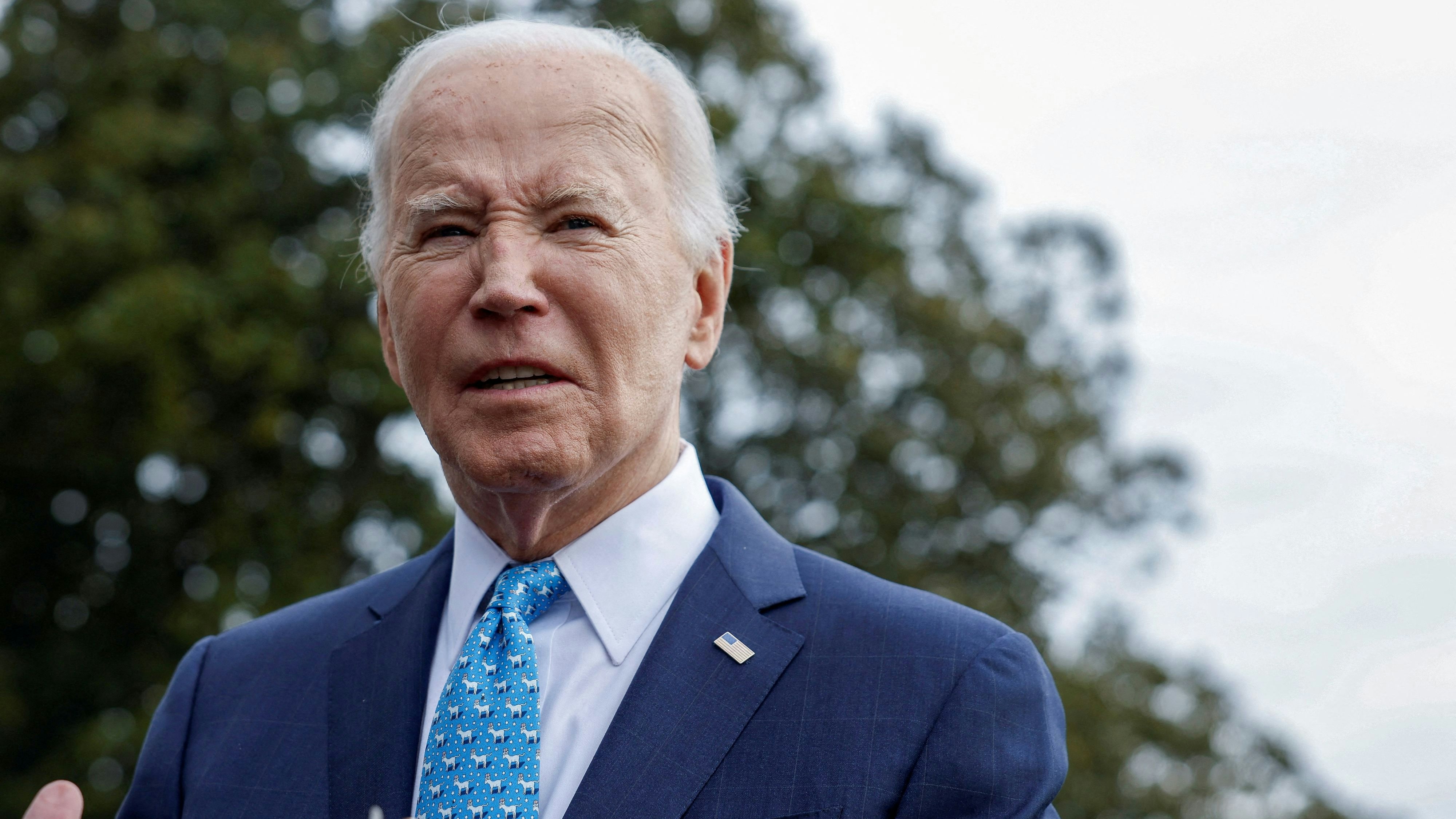 FILE PHOTO: U.S. President Joe Biden looks on as he speaks to the media, before deparing the White House for Florida, in Washington, U.S., January 30, 2024. REUTERS/Evelyn Hockstein/File Photo