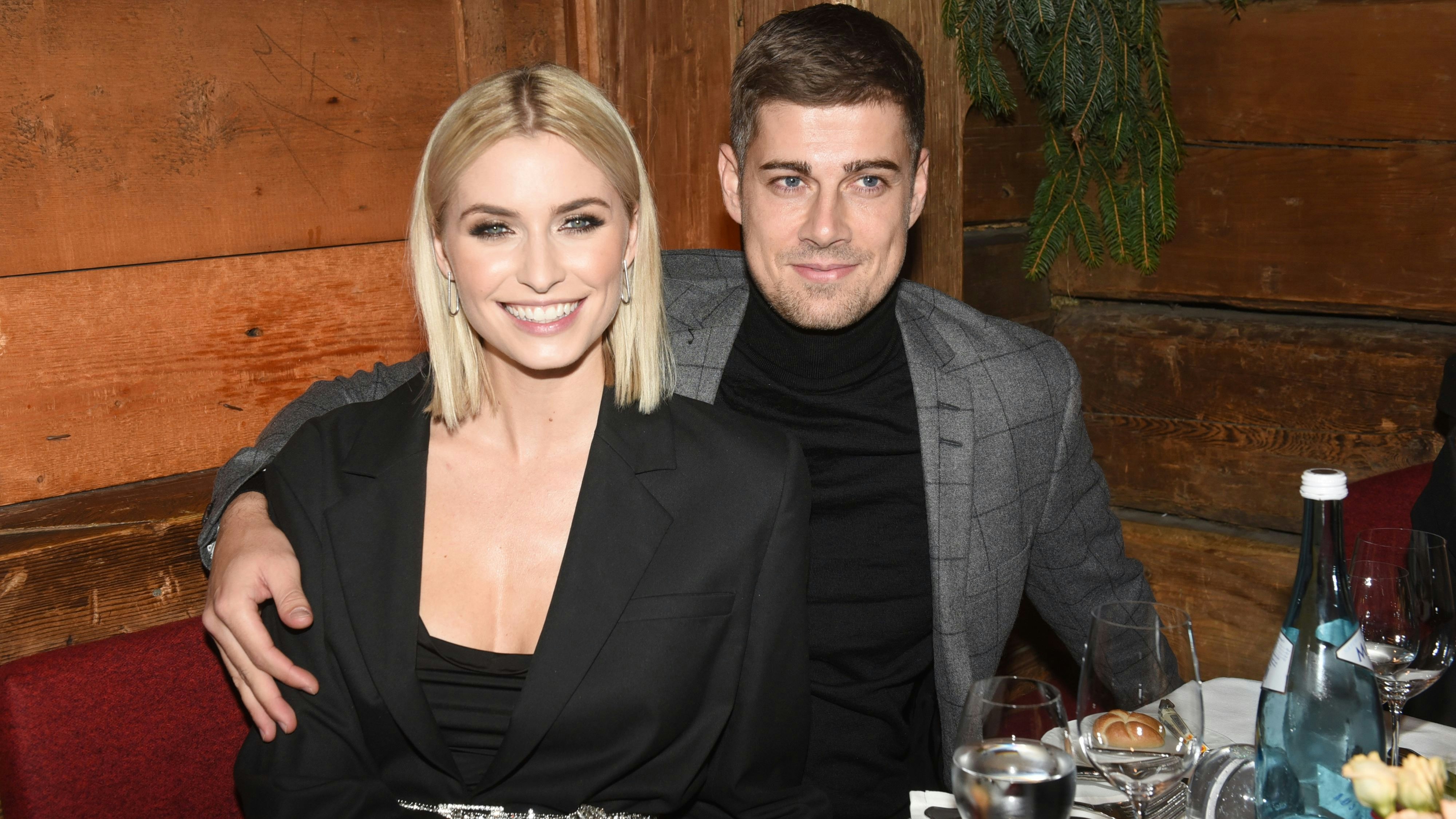 Download von www.picturedesk.com am 09.02.2024 (20:44).  28 November 2019, Austria, Going: Lena Gercke, model and entrepreneur, smiles with her partner Dustin Schöne at her Christmas party at the Wellnesshotel Stanglwirt. Photo: Ursula Düren/dpa - 20191128_PD11362 - Rechteinfo: Rights Managed (RM)