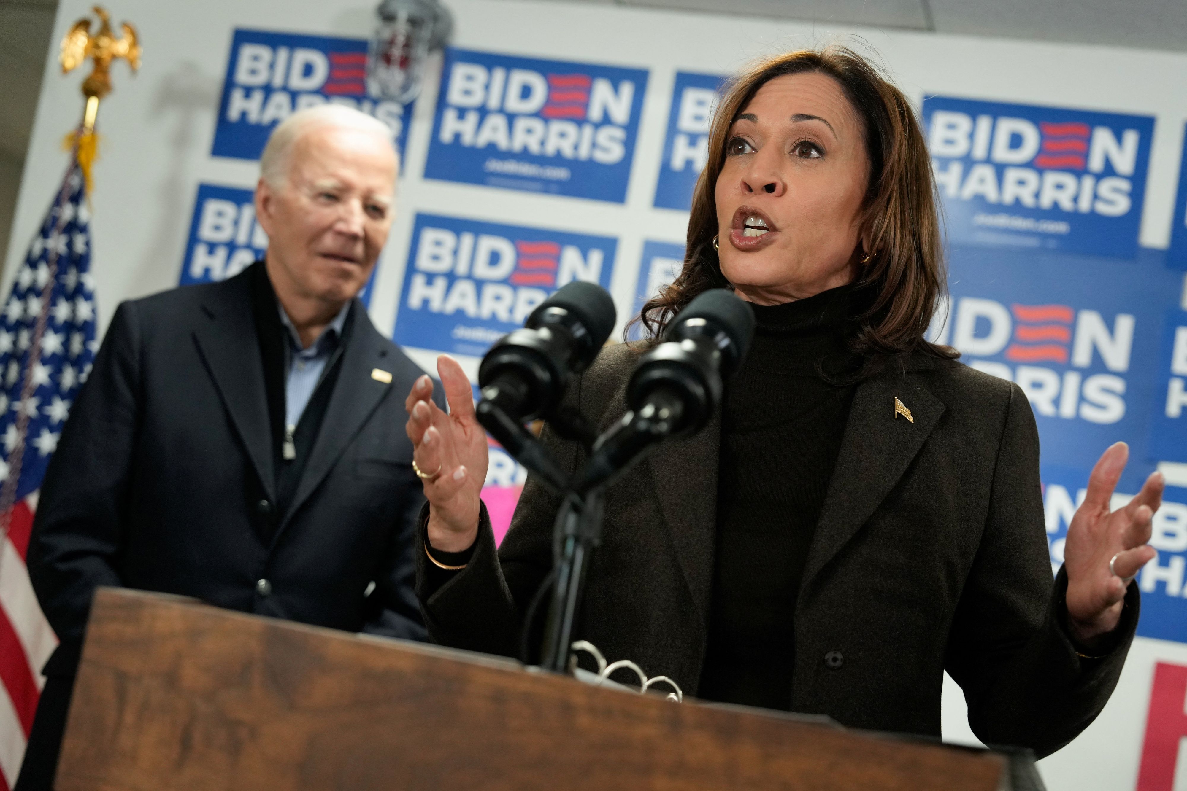 Vice President Kamala Harris speaks next to U.S. President Joe Biden during the opening of the Biden for President campaign office in Wilmington, Delaware, U.S., February 3, 2024. REUTERS/Joshua Roberts