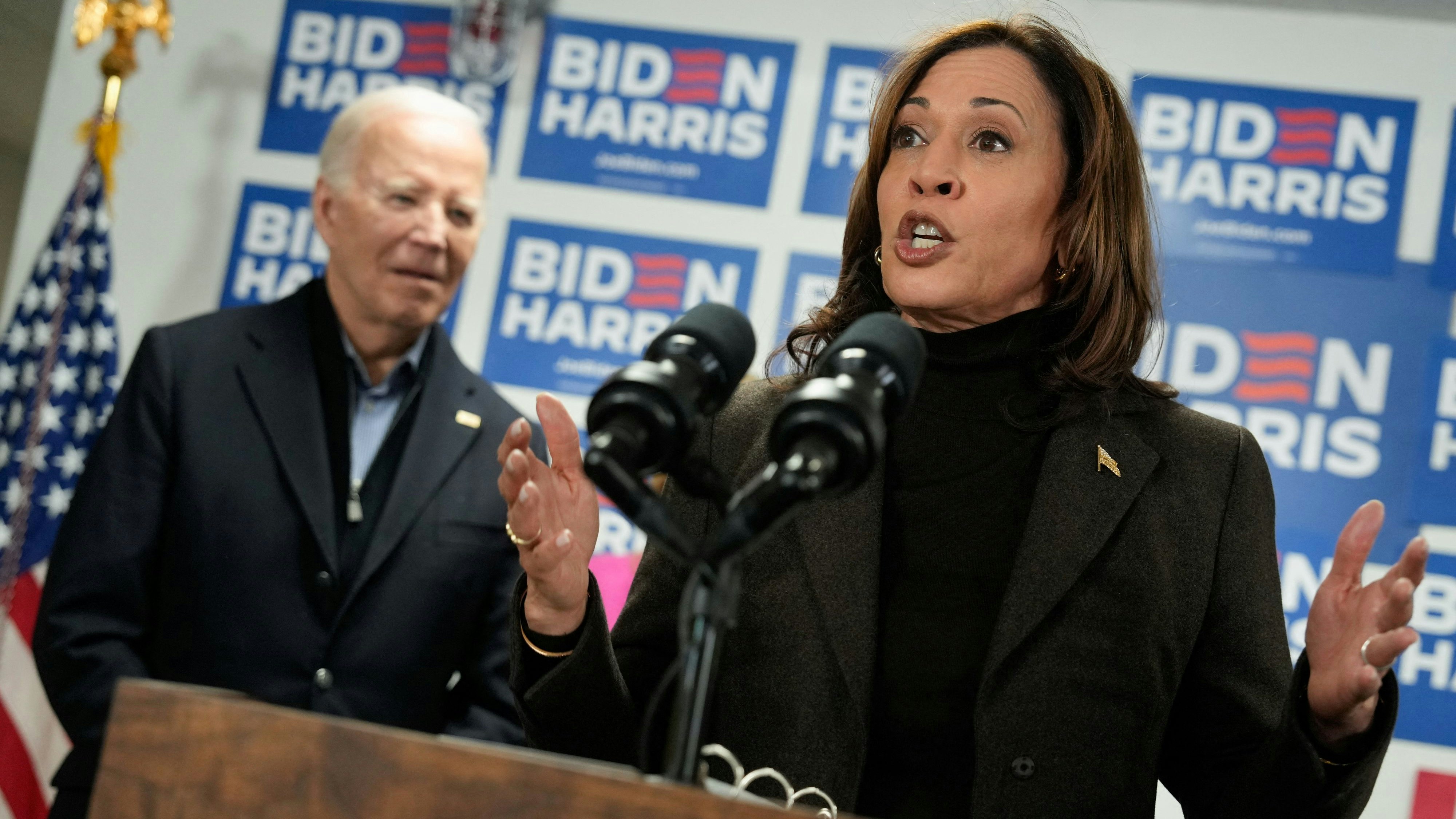 Vice President Kamala Harris speaks next to U.S. President Joe Biden during the opening of the Biden for President campaign office in Wilmington, Delaware, U.S., February 3, 2024. REUTERS/Joshua Roberts