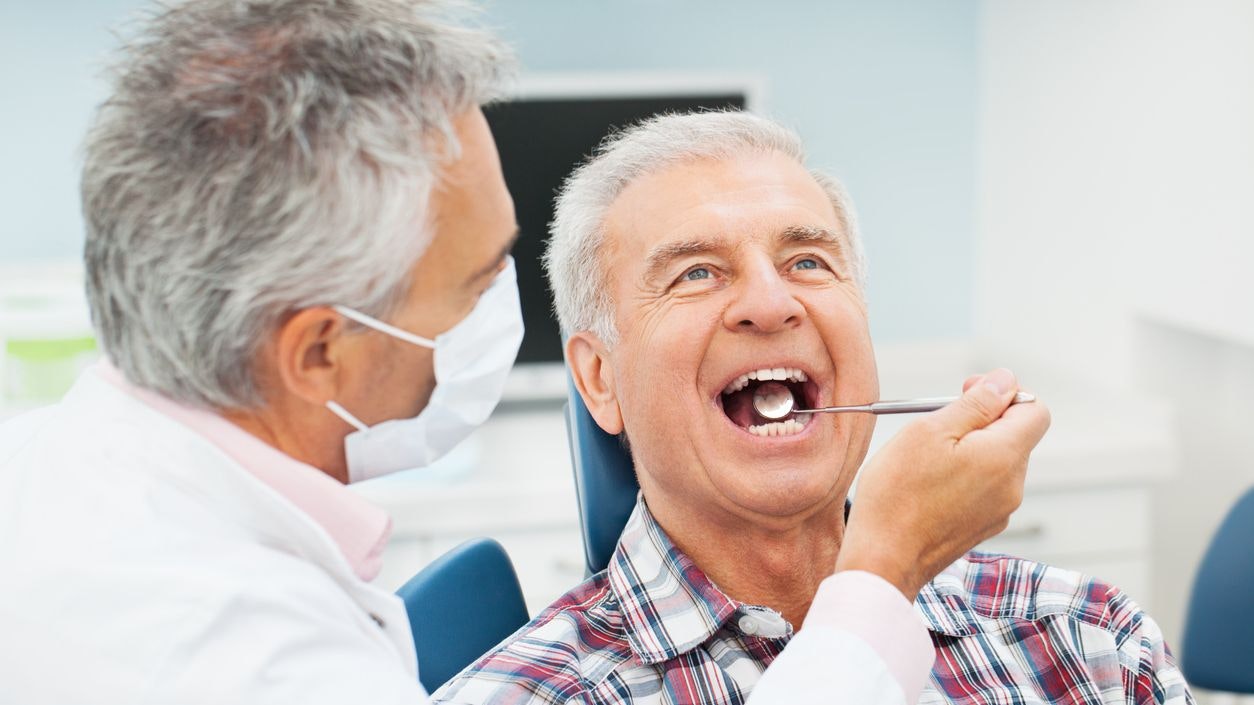 Senior man at the dentist