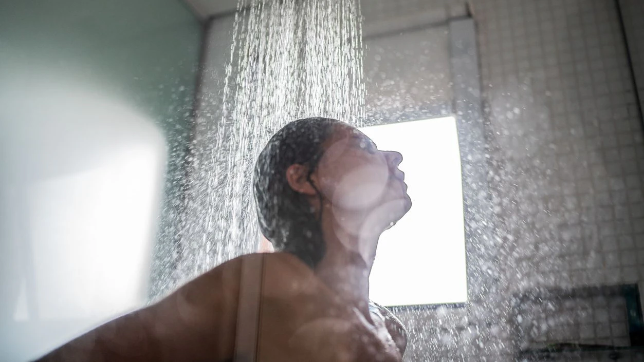 Woman taking a shower at home