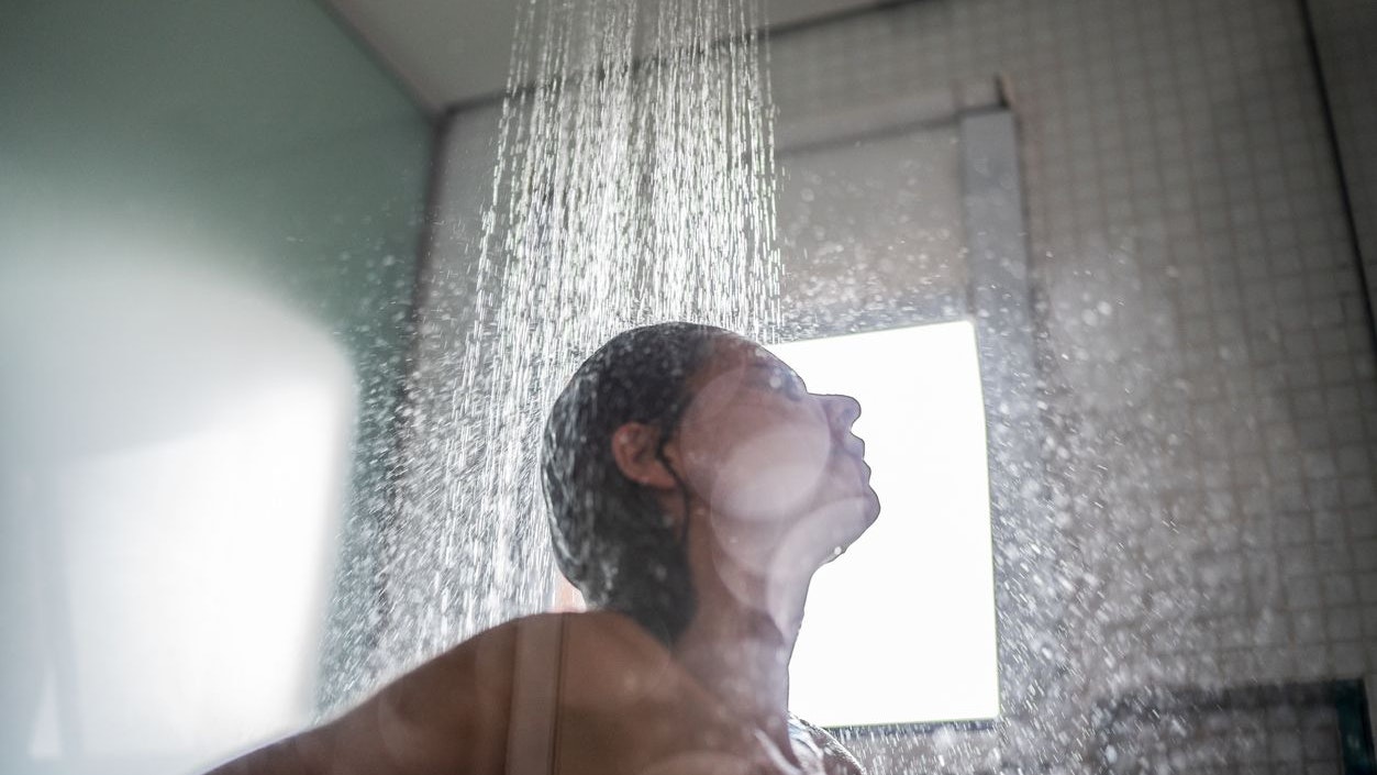 Woman taking a shower at home