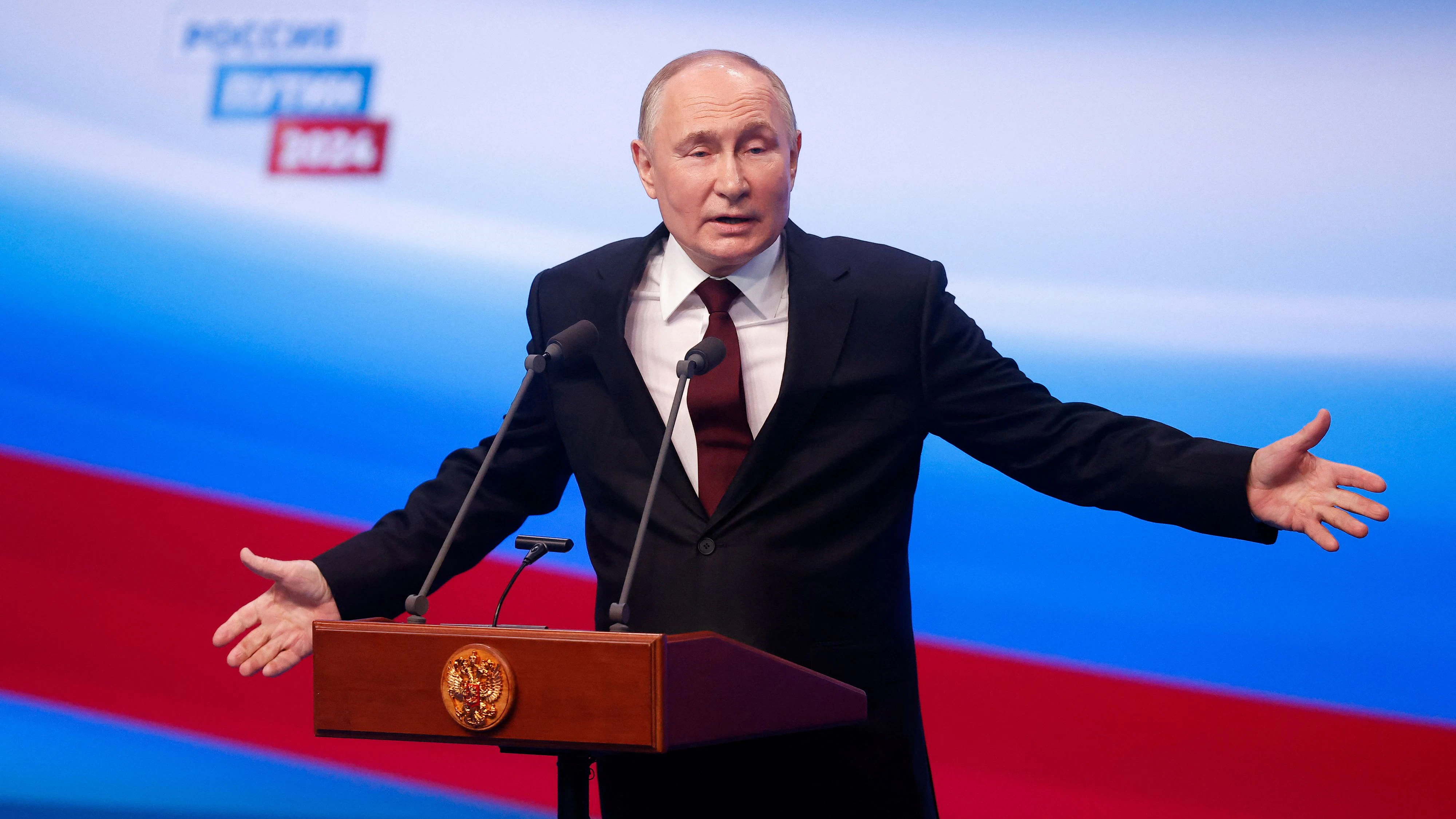 Russian presidential candidate and incumbent President Vladimir Putin speaks after polling stations closed, in Moscow, Russia, March 18, 2024. REUTERS/Maxim Shemetov 