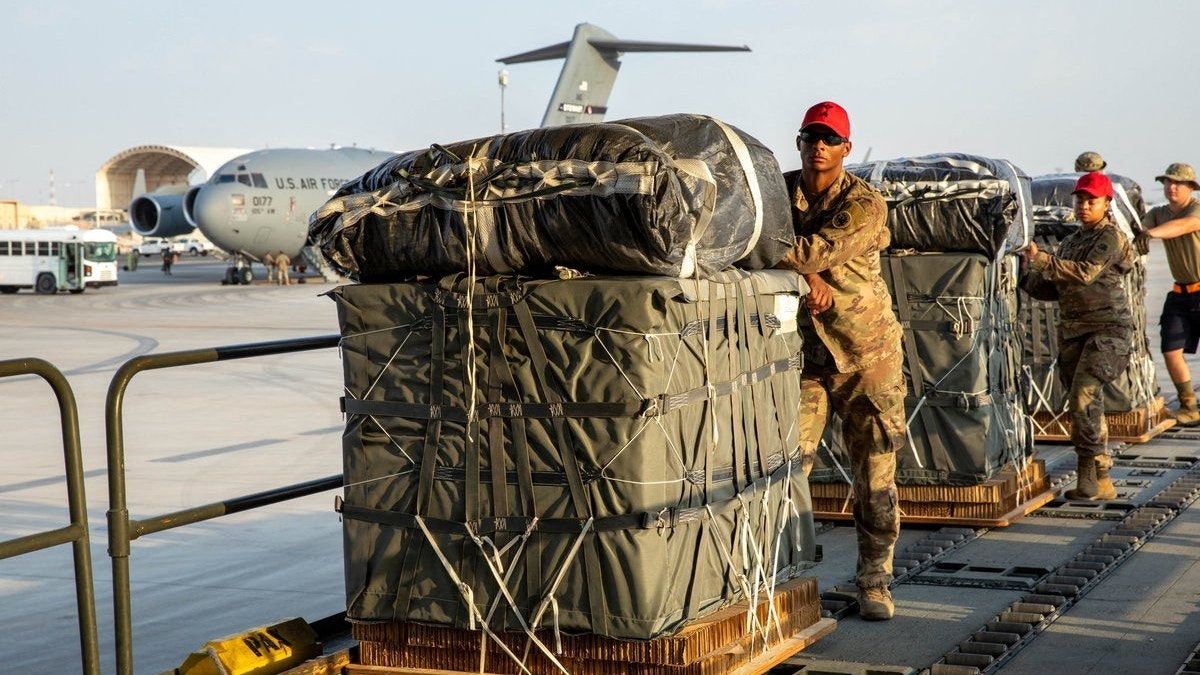 U.S. Air Force members work on the preparation of a humanitarian aid drop for Gaza residents, in this picture released on March 5, 2024. US Central Command via X/Handout via REUTERS    THIS IMAGE HAS BEEN SUPPLIED BY A THIRD PARTY