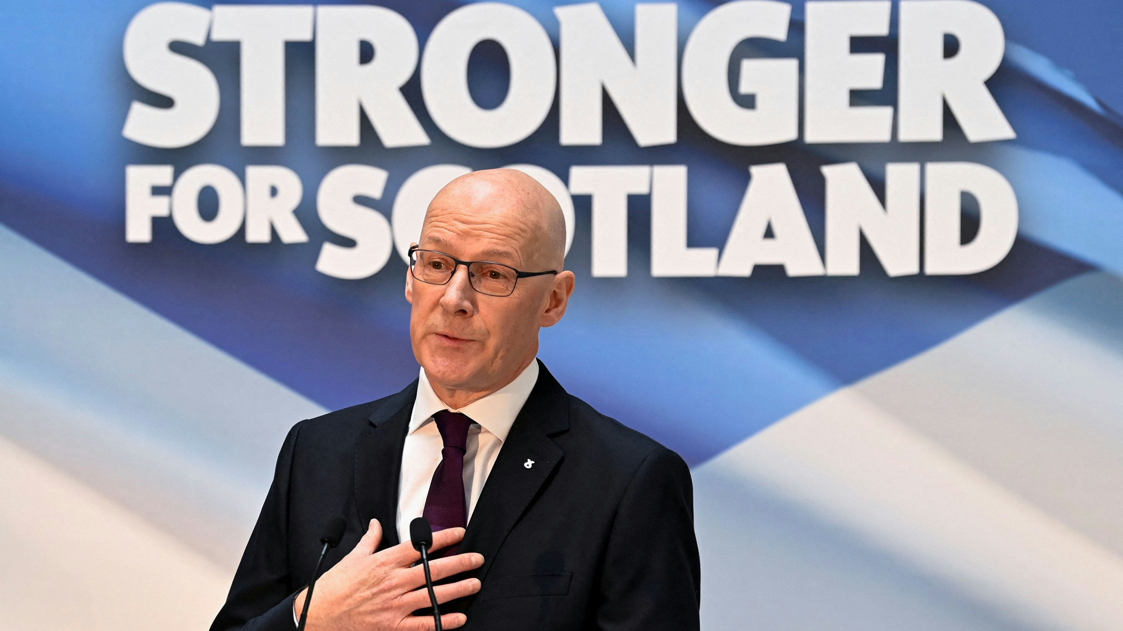 Candidate for the leadership of the Scottish National Party (SNP) John Swinney gestures, as he delivers a speech to confirm his victory - also being set to succeed Humza Yousaf as the country's First Minister - at an event at Glasgow University, Glasgow, Scotland, Britain, May 6, 2024. REUTERS/Lesley Martin