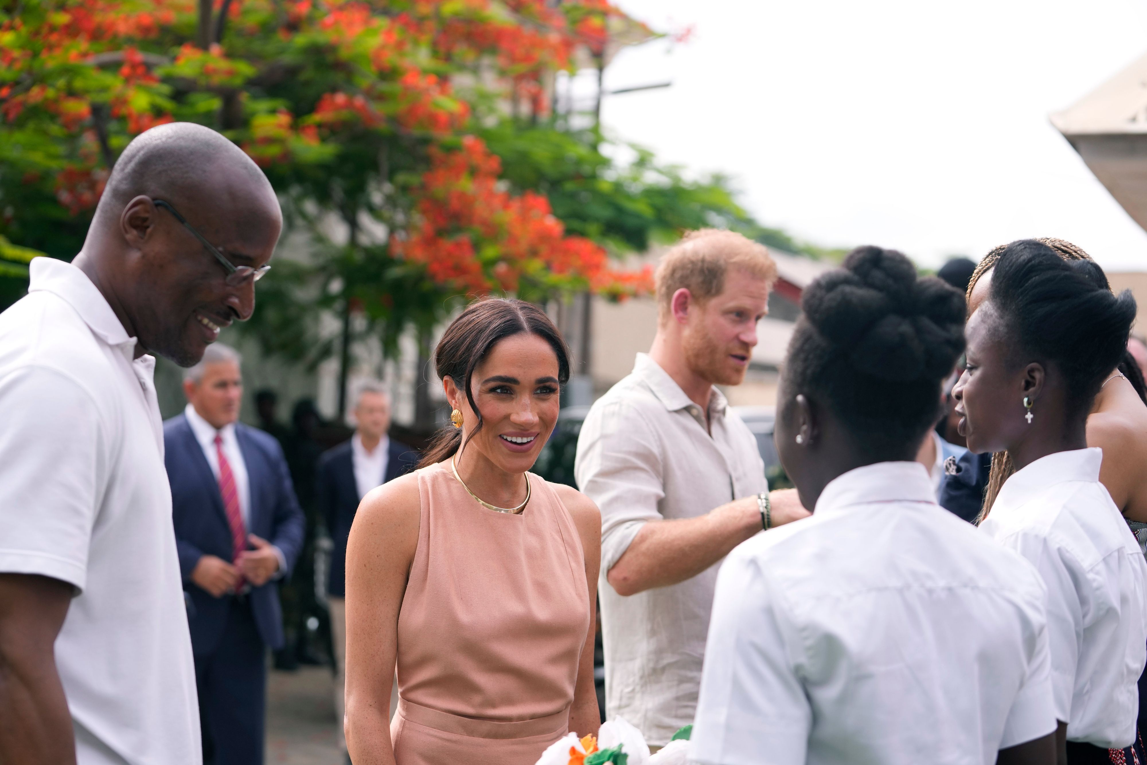 Meghan spricht in Nigeria über ihre Liebe zu Harry.