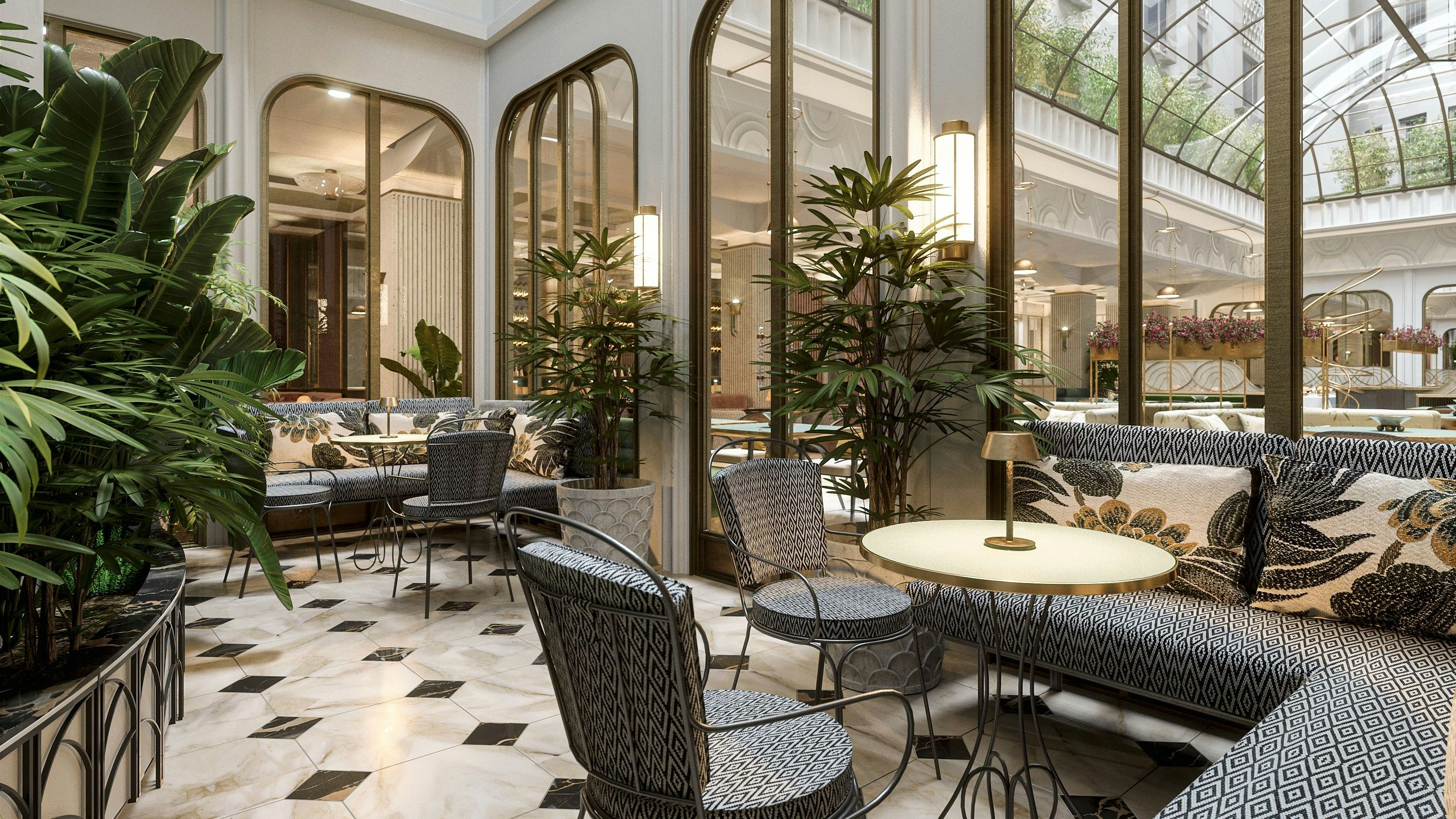 Die Lobby des Hotels mit einem glasüberdachten Atrium