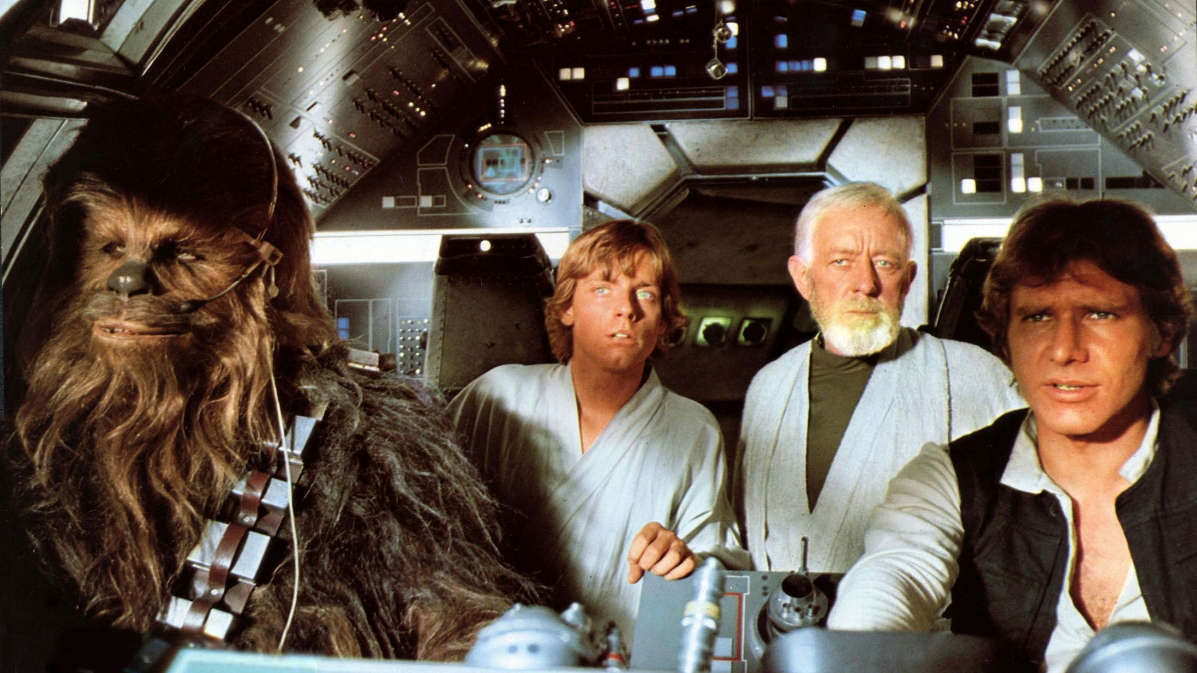 Der Beginn einer Kino-Legende: Der Wookie Chewbacca (Peter Mayhew), Luke Skywalker (Mark Hamill), Obi-Wan Kenobi (Sir Alec Guinness) und Han Solo (Harrison Ford) im ersten "Star Wars"-Film von 1977