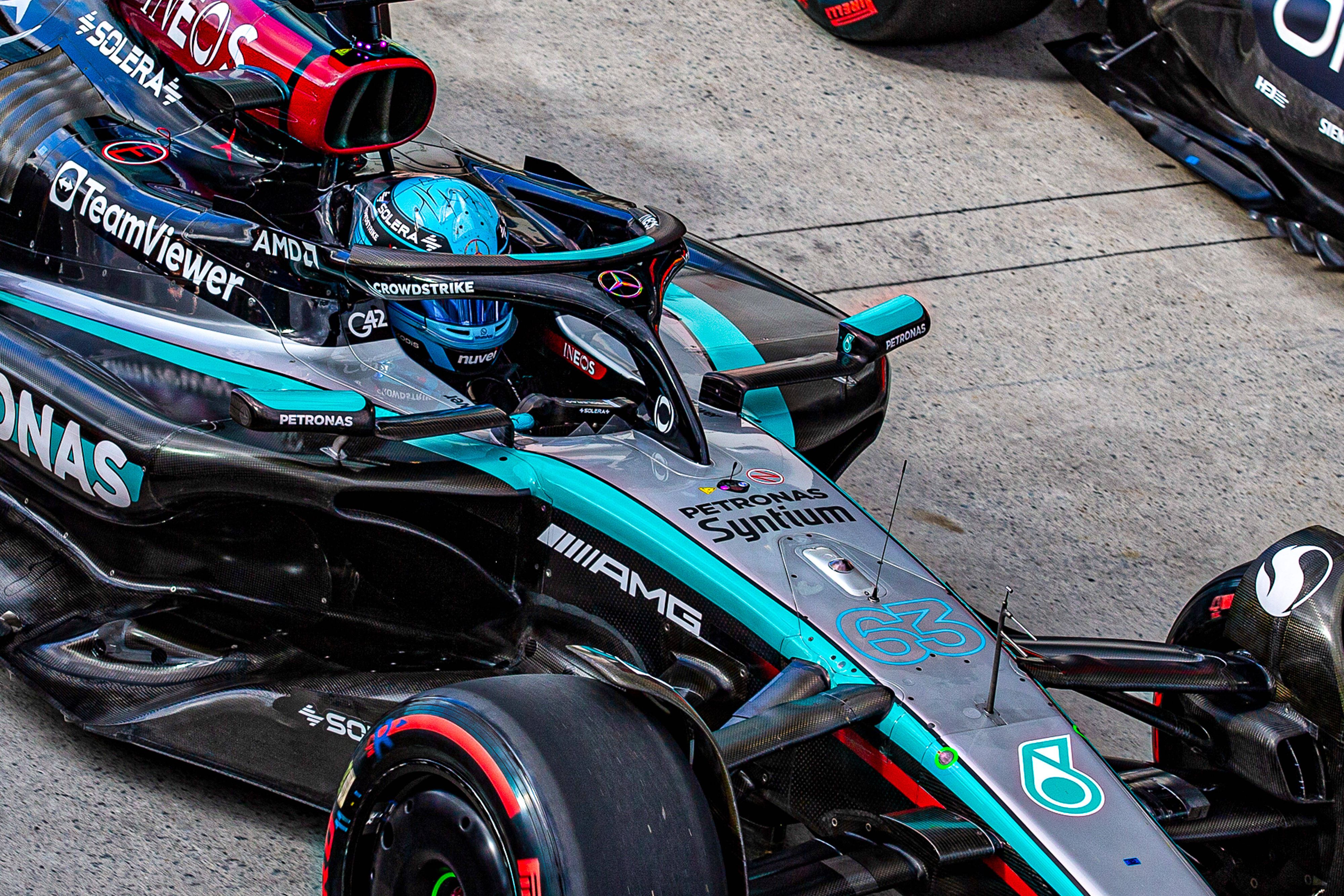 Mercedes-Mann George Russelll. 