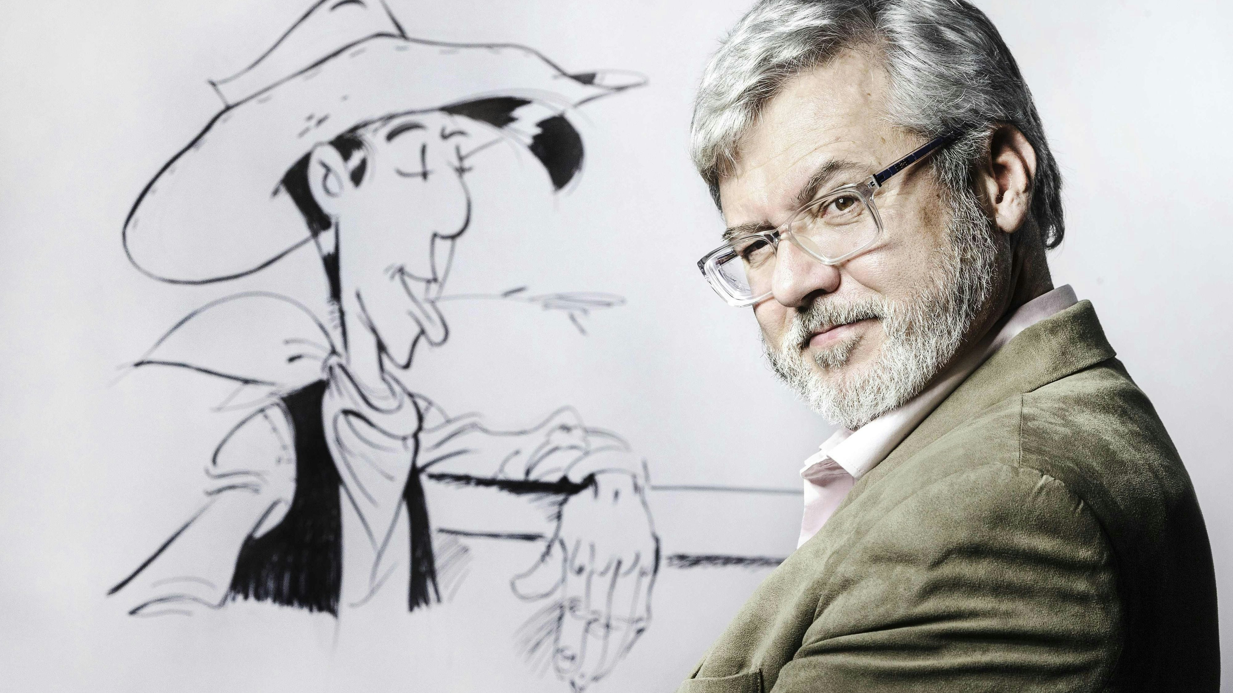 Download von www.picturedesk.com am 25.06.2024 (17:09).  (FILES) In this file photo taken on November 24, 2016 Lucky Luke comics series cartoonist Herve Darmenton, also known as Achde, poses in Paris. - The next publication of Lucky Luke will put African Americans in a more prominent position, the writer of the comics series announced on June 15, 2020. (Photo by JOEL SAGET / AFP) - 20161124_PD16928 - Rechteinfo: Rights Managed (RM) Nur für redaktionelle Nutzung! Werbliche Nutzung erfordert Freigabe: bitte schicken Sie uns eine Anfrage.