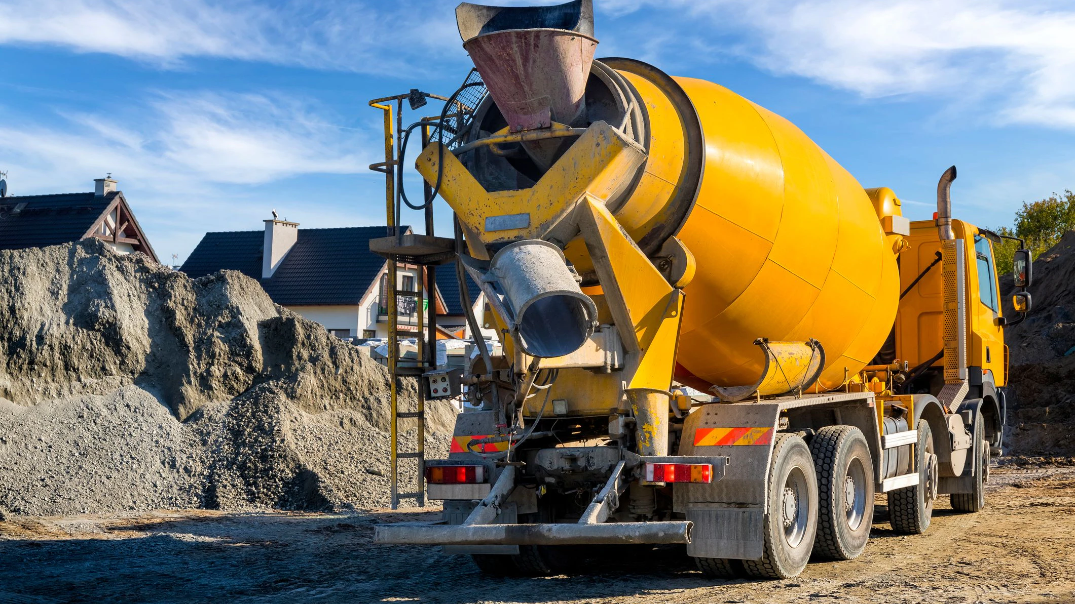 Concrete mixer truck on the construction of a local road in the suburbs, Szczecin, Poland