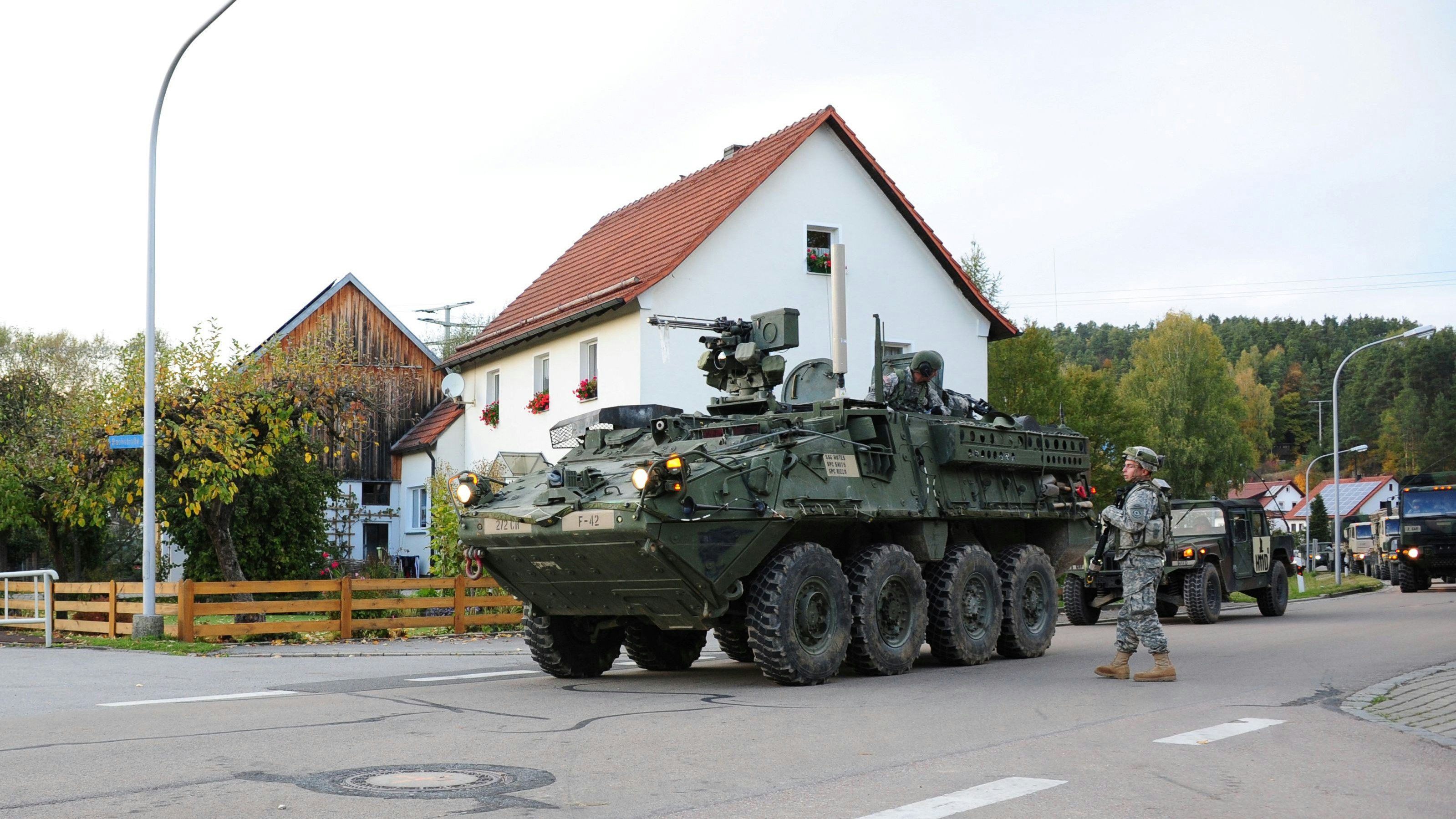 U.S. Army Europe vehicles belonging to the2nd Calvary Regiment move on their way south during exercise Saber Junction 2012 through the village of Hausen, Germany October 16, 2012. Picture taken October 16, 2012.   ATTENTION EDITORS - THIS IMAGE WAS PROVIDED BY A THIRD PARTY.
