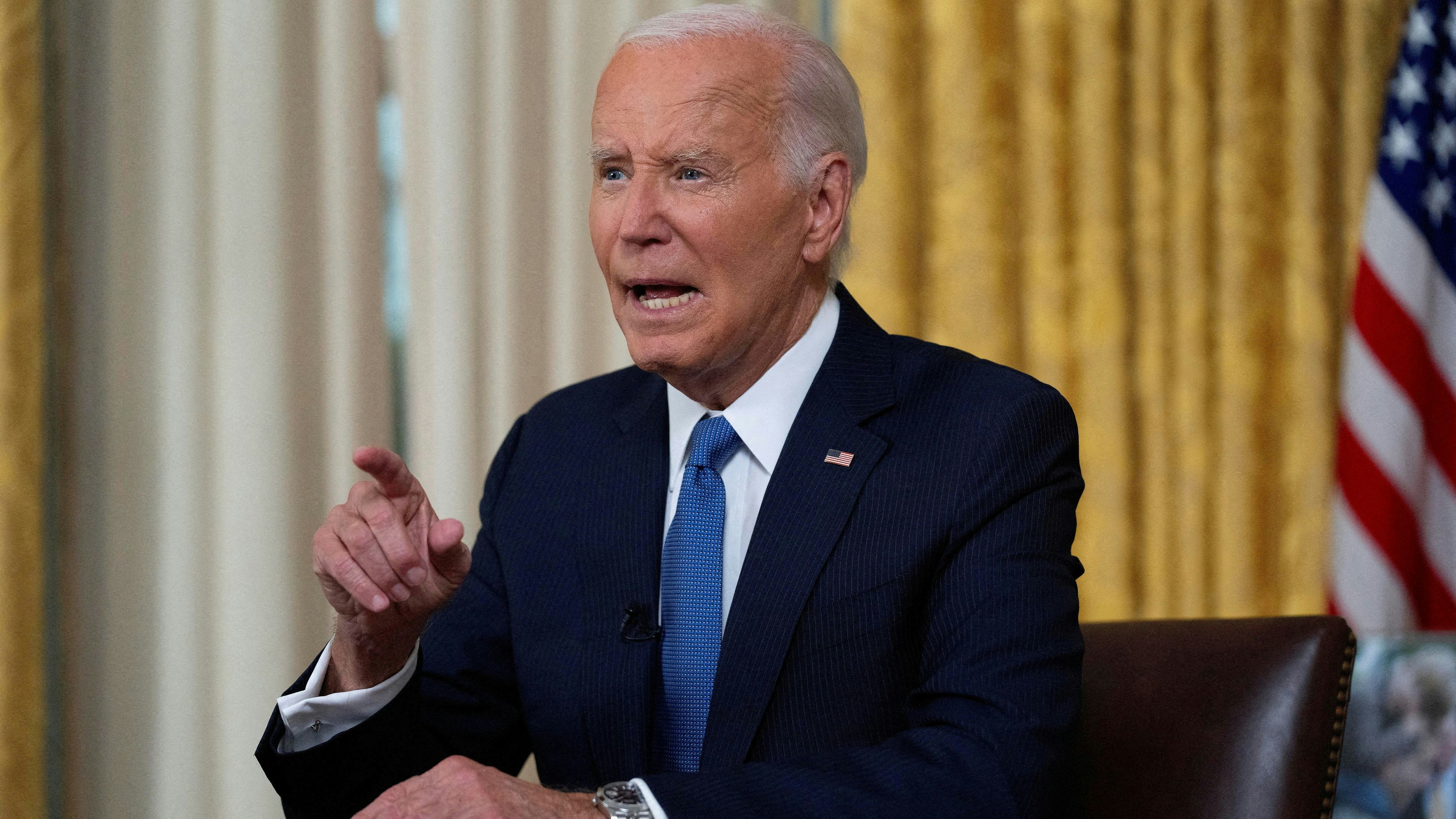 FILE PHOTO: U.S. President Joe Biden addresses the nation from the Oval Office of the White House in Washington, Wednesday, July 24, 2024, about his decision to drop his Democratic presidential reelection bid.     Evan Vucci/Pool via REUTERS/File Photo