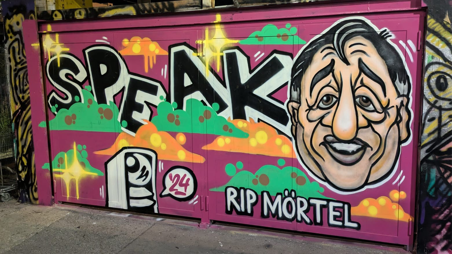 Ein Graffiti-Gemälde am Donaukanal berührt die Passanten. Es gilt Richard Lugner, der kürzlich verstarb.