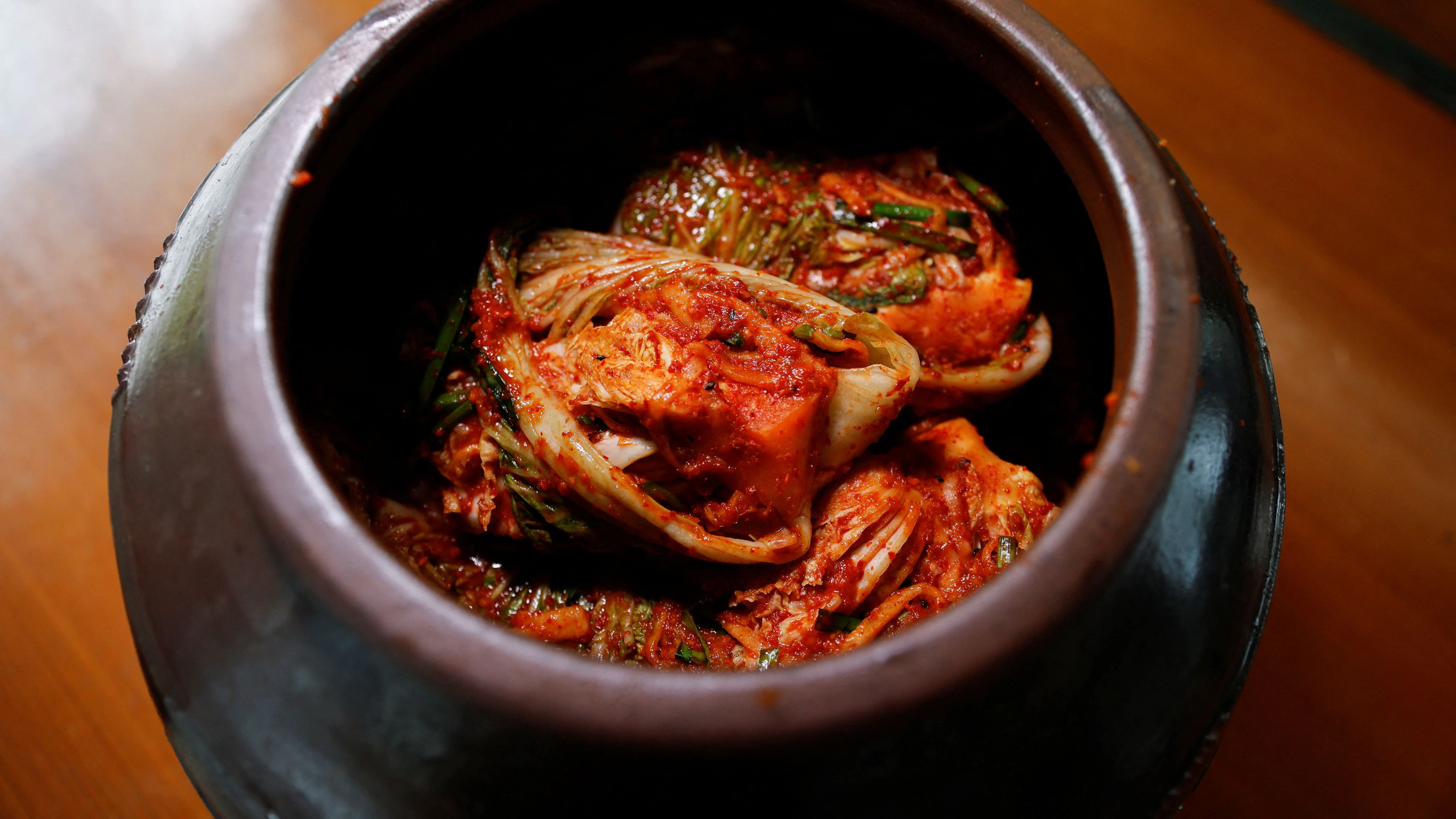 Kimchi in a jar at the Kimchi Culture Institute in Namyangju, South Korea, August 21, 2024. REUTERS/Kim Soo-hyeon