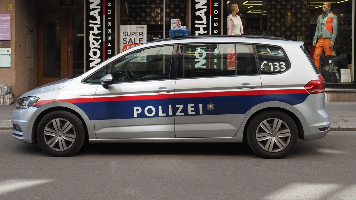 Vienna, Austria - Circa September 2022: Polizie translation Police car