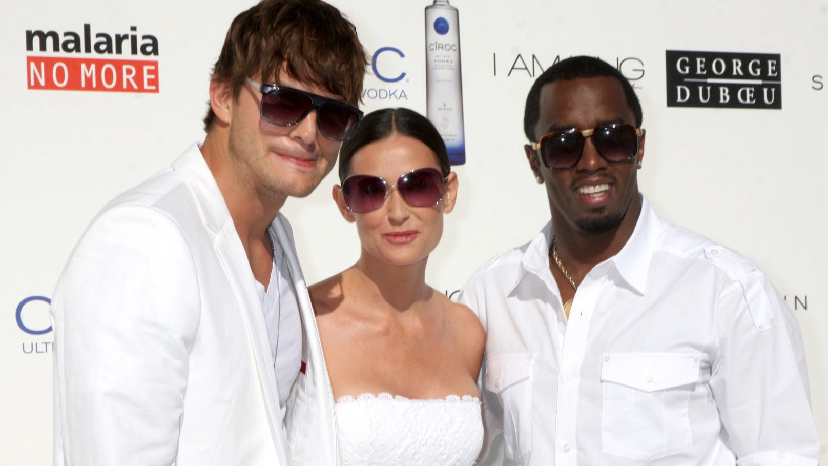 Im Jahr 2009 war alles vorbei: Ashley Kutcher (l.), Demi Moore und Combs waren zum letzten Mal auf einer "White Party" zu sehen.