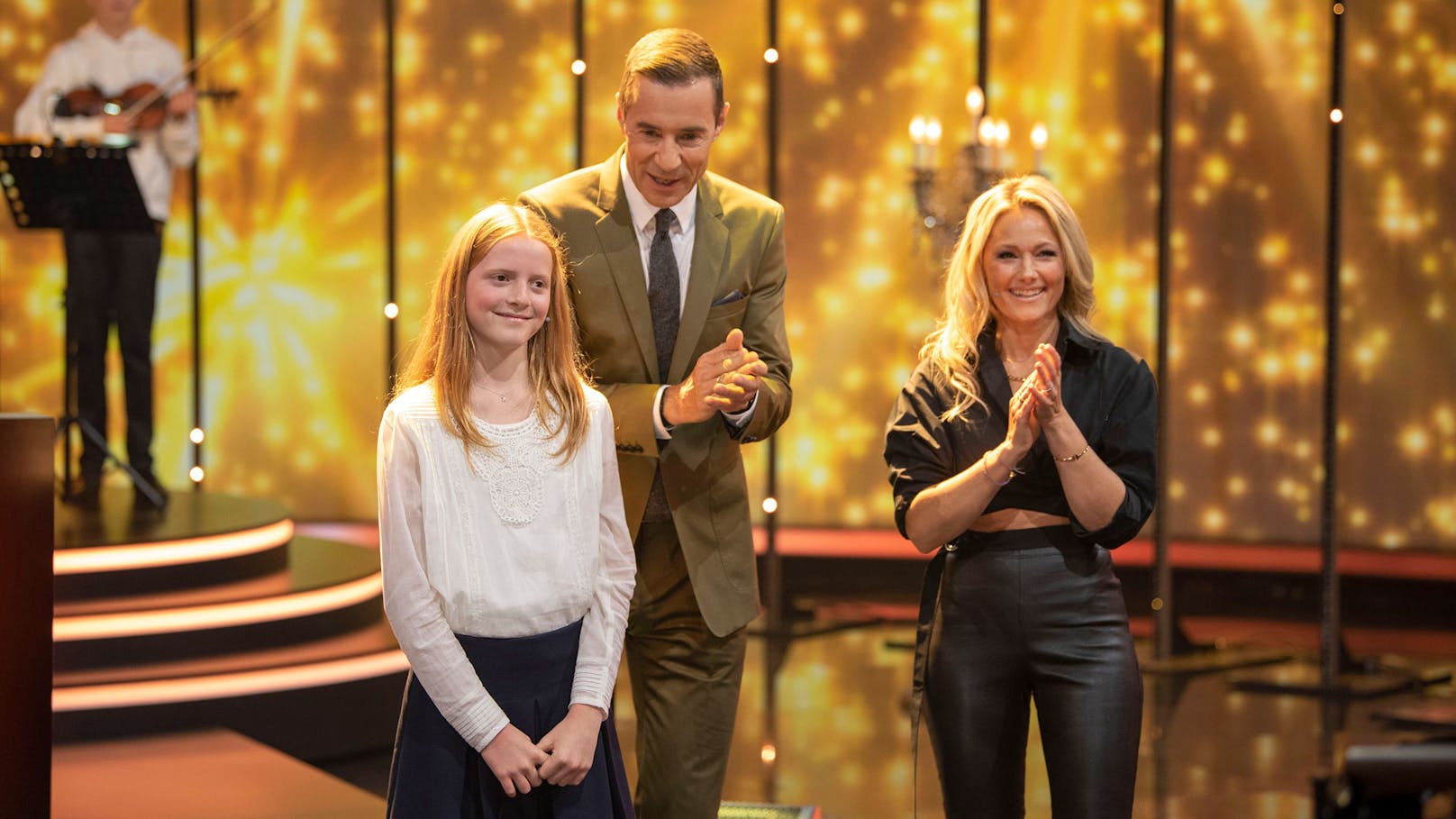 Johanna (10), Kai Pflaume und Helene Fischer (v. l. n. r.).