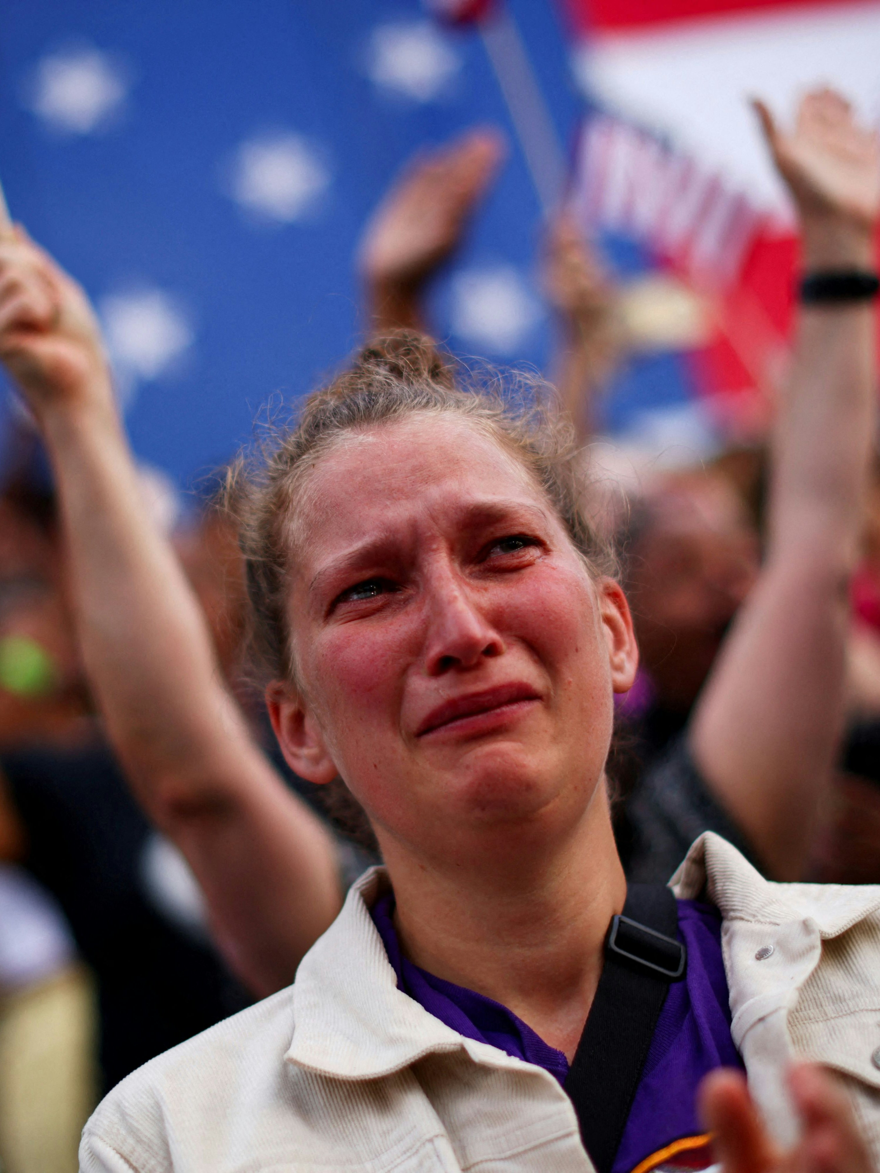 A supporter reacts as Democratic presidential nominee U.S. Vice President Kamala Harris delivers remarks, conceding the 2024 U.S. presidential election to President-elect Donald Trump, at Howard University in Washington, U.S., November 6, 2024.      TPX IMAGES OF THE DAY     