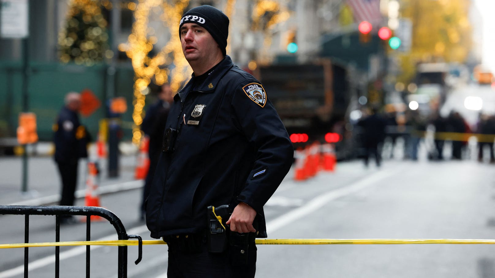 A police officer stands near the scene where the CEO of United Healthcare Brian Thompson was reportedly shot and killed in Midtown Manhattan, in New York City, US, December 4, 2024.