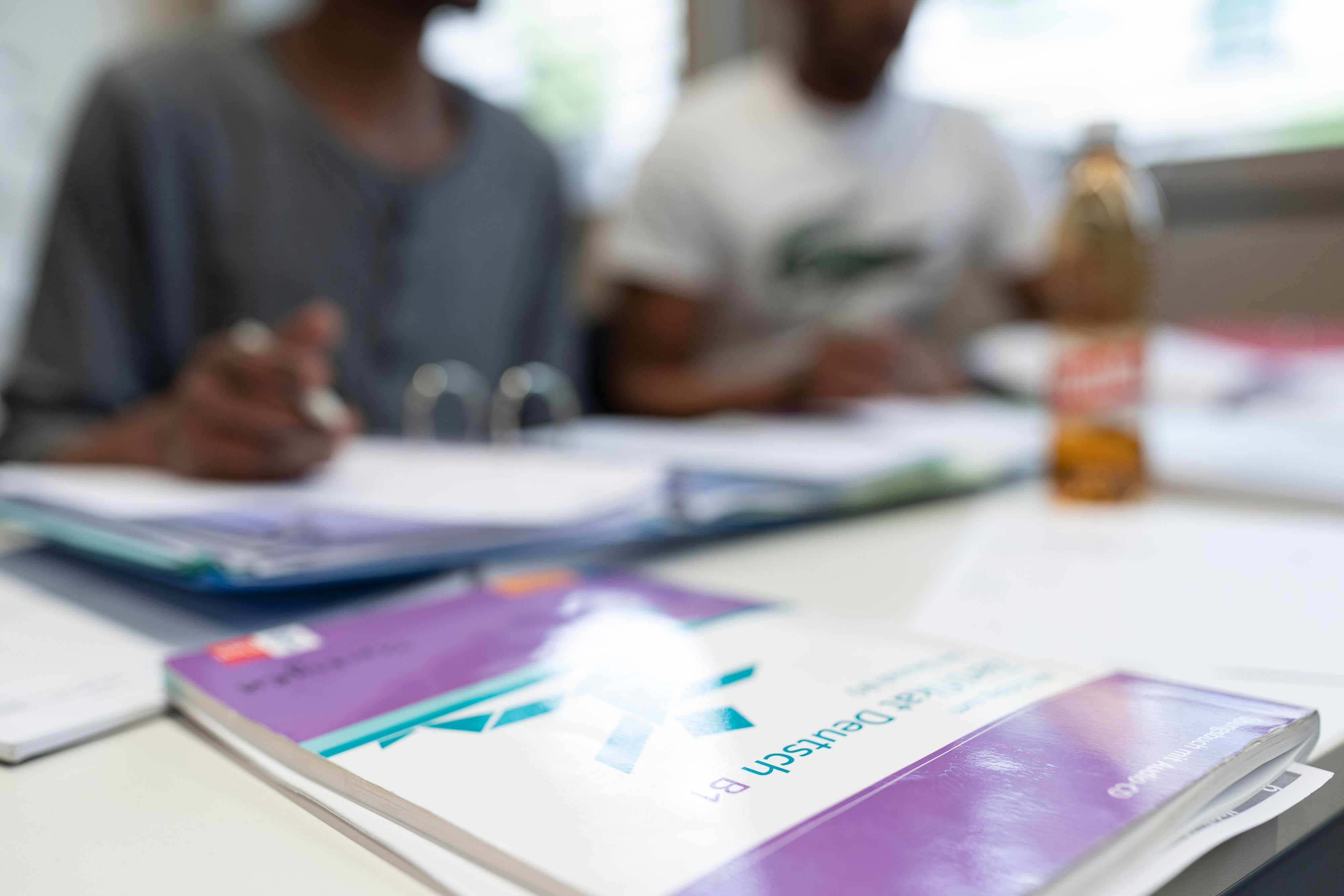 Die Grünen kritisieren Sparmaßnahmen bei Deutschkursen für Migranten. (Symbolbild)