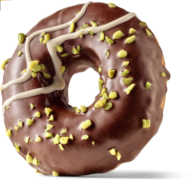 Der "Dubai Chocolate Donut" ist mit Schokolade überzogen und punktet mit einer cremigen, crunchy Pistazien-Kadiri-Füllung sowie knackigen, geraspelten Pistazienstücken.