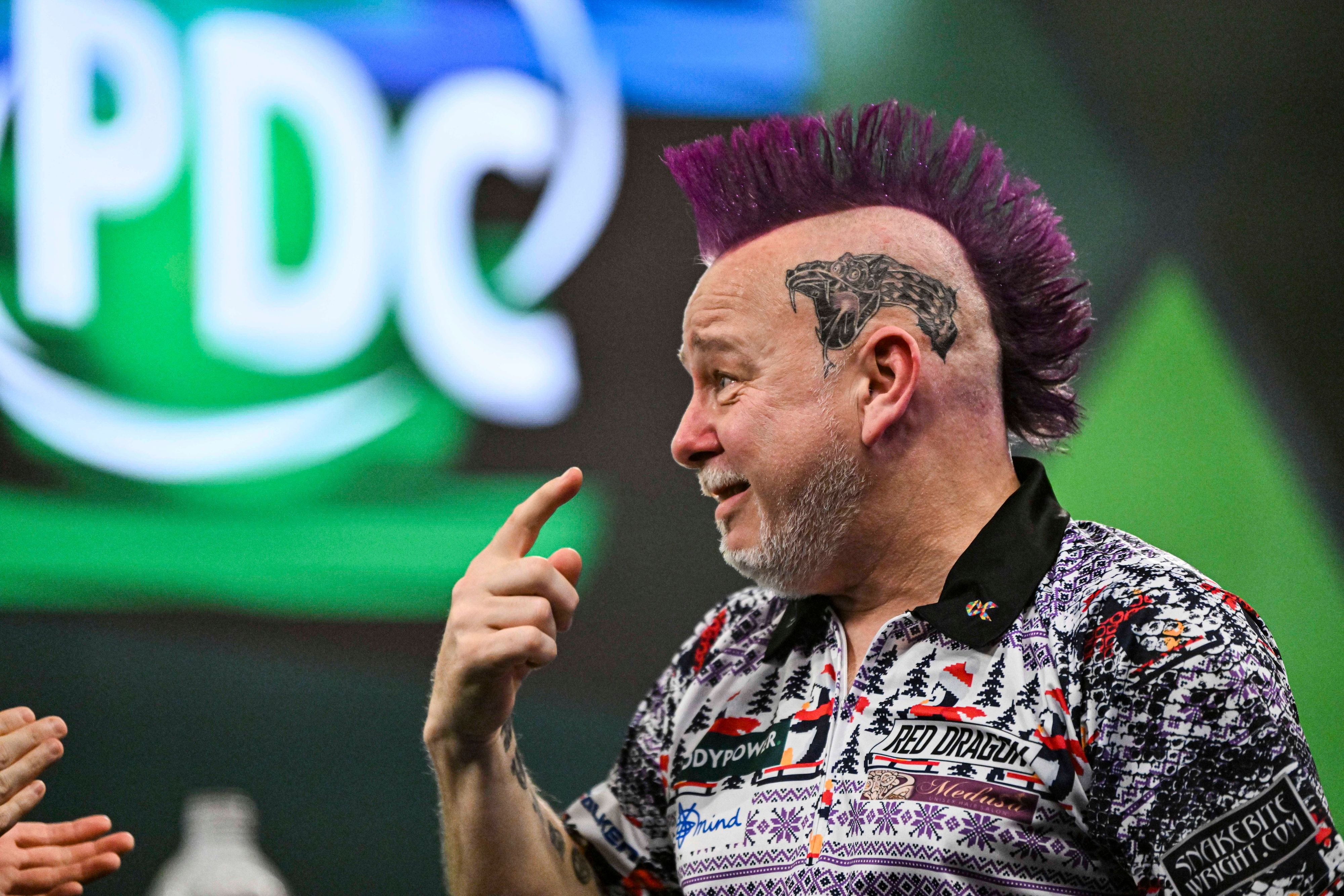 Peter Wright bricht in Tränen aus.