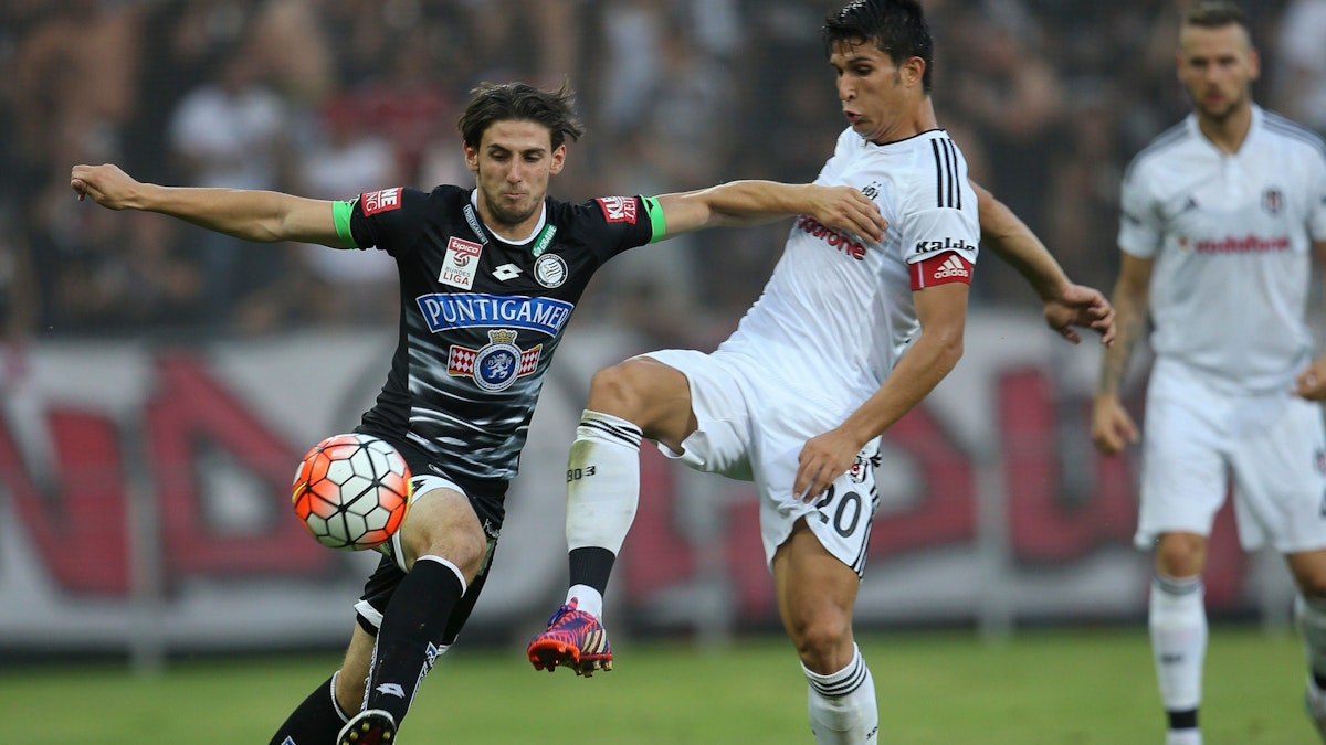 GRAZ,AUSTRIA,22.JUL.15 - SOCCER - IFCS, tipico Bundesliga, Sueper Lig, SK Sturm Graz vs Besiktas Istanbul, test match. Image shows Danijel Klaric (Sturm) and Necip Uysal (Besiktas). Photo: GEPA pictures/ Wolfgang Grebien