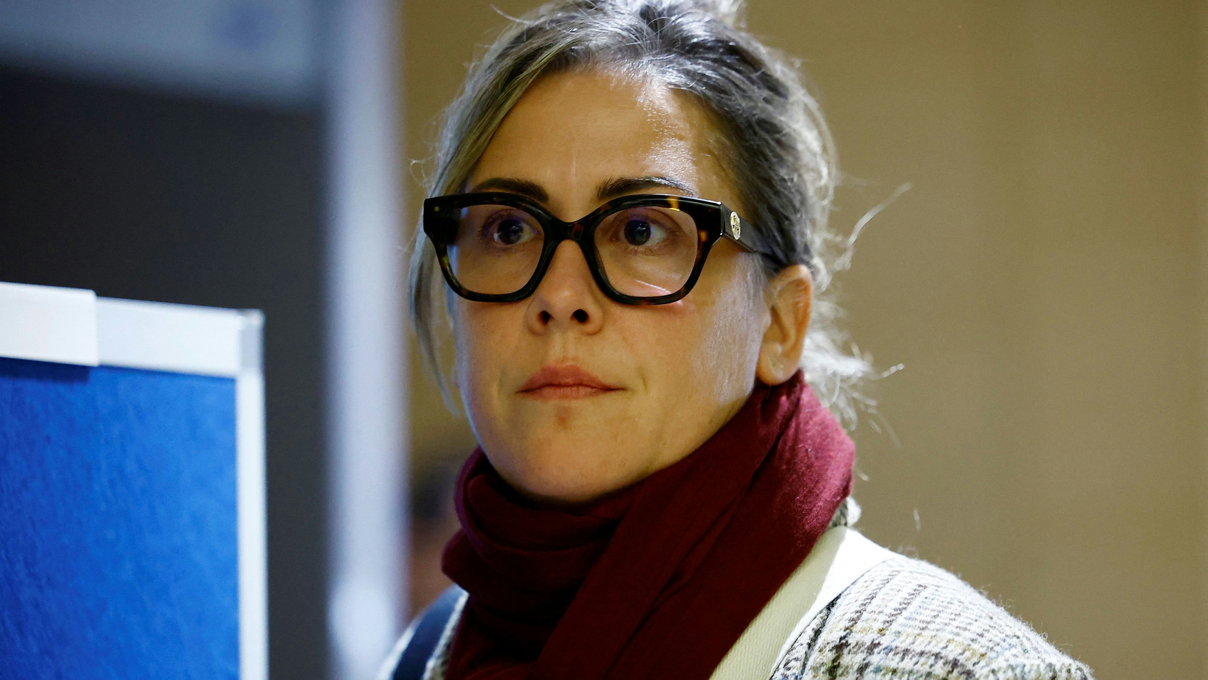 Caroline Darian, the daugther of Frenchwoman Gisele Pelicot, the victim of an alleged mass rape orchestrated by her husband Dominique Pelicot at their home in the southern French town of Mazan, leaves after a hearing in the trial of Dominique Pelicot with 50 co-accused, at the courthouse in Avignon, France, November 19, 2024. 