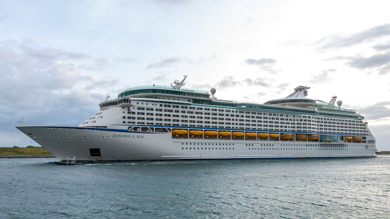 Cape Canaveral, Florida, USA - May19, 2021: The Royal Carribbean cruise ship "Explorer of the Seas" underway in Port Canaveral. The ship is not carrying passengers as cruises are suspended due to the Covid 19 pandemic