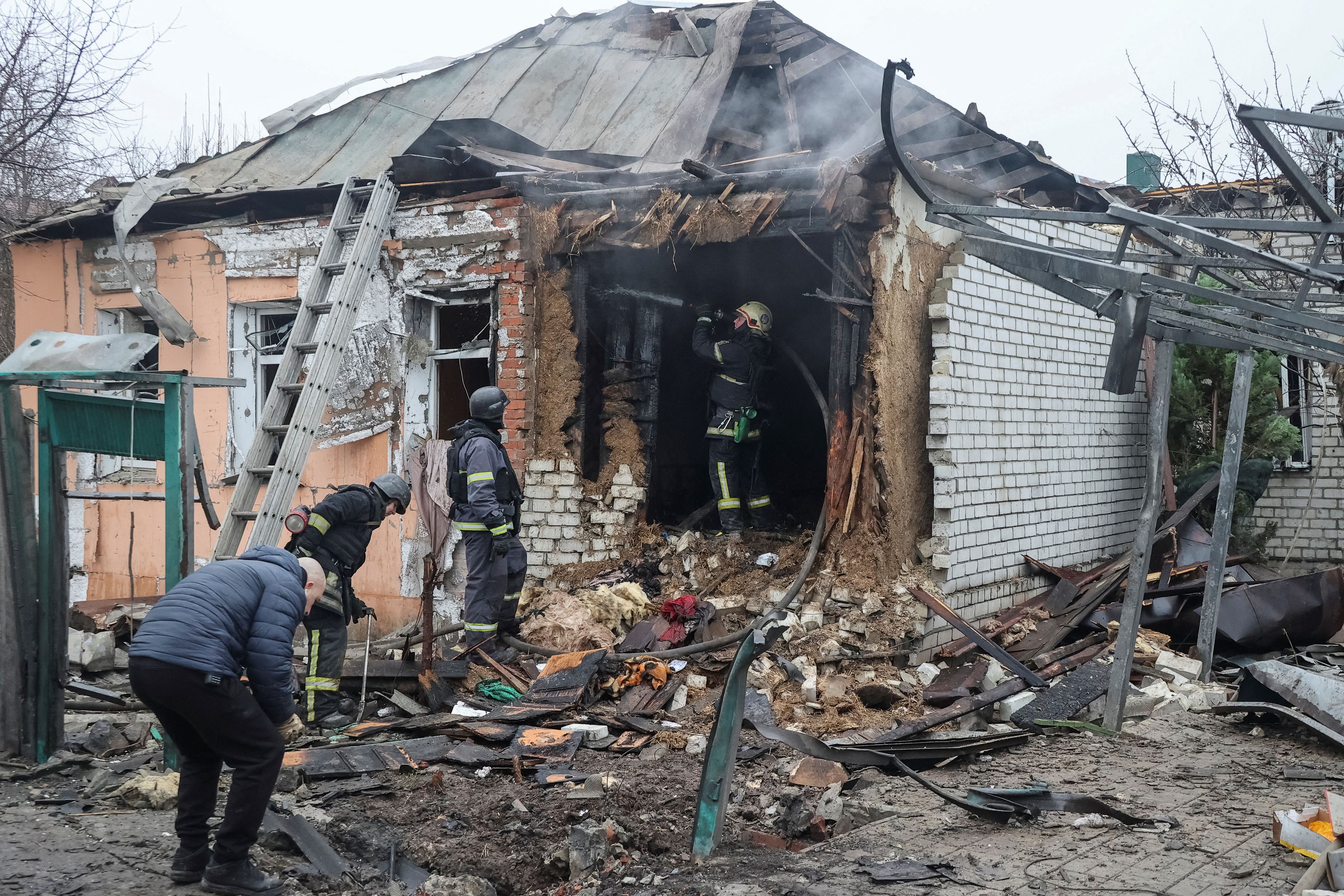 Firefighters work at a site of a Russian drone strike, amid Russia's attack on Ukraine, in Kharkiv, Ukraine February 1, 2025. REUTERS/Vyacheslav Madiyevskyy