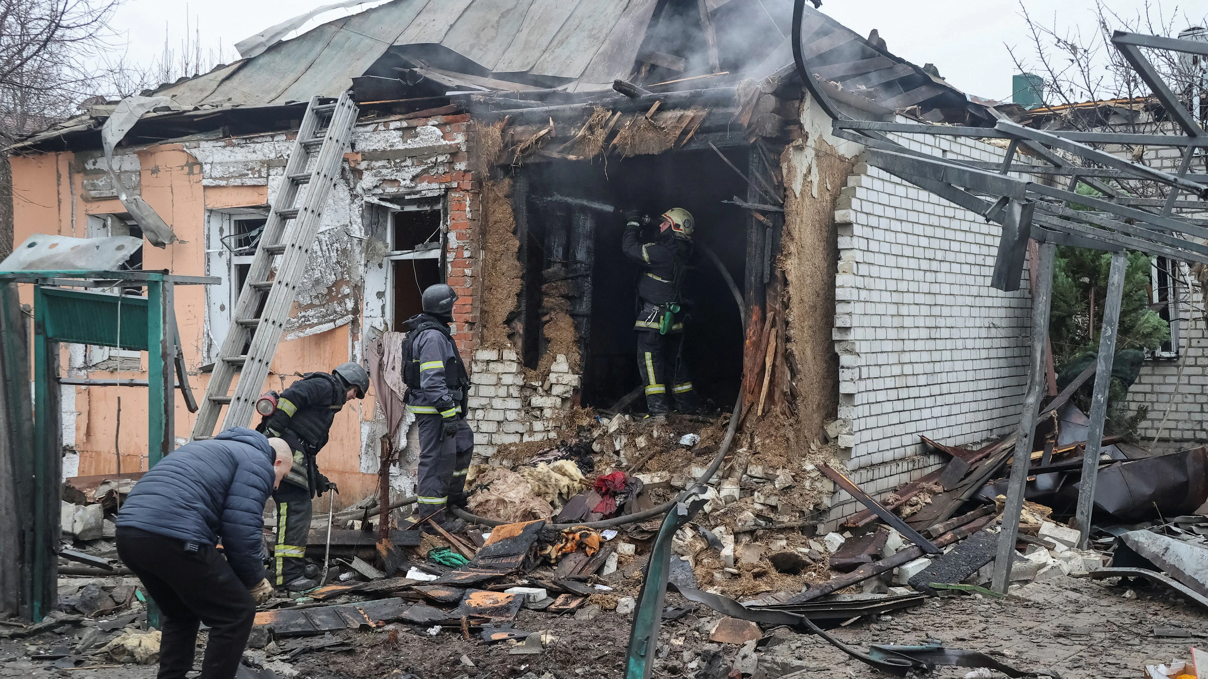 Firefighters work at a site of a Russian drone strike, amid Russia's attack on Ukraine, in Kharkiv, Ukraine February 1, 2025. REUTERS/Vyacheslav Madiyevskyy
