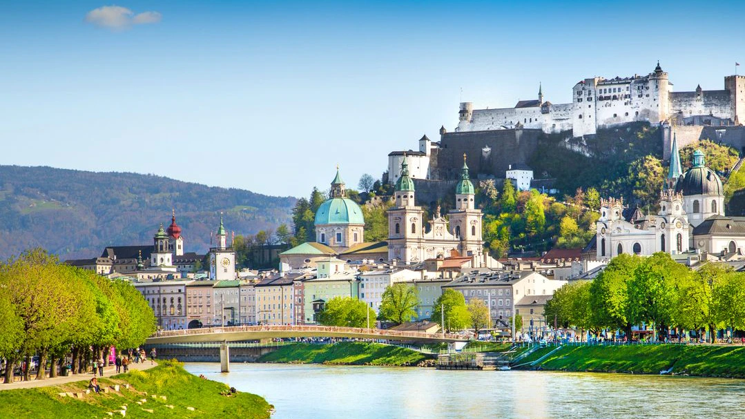 Beautiful view of Salzburg skyline with Festung Hohensalzburg and Salzach river in summer, Salzburg, Salzburger Land, Austria.