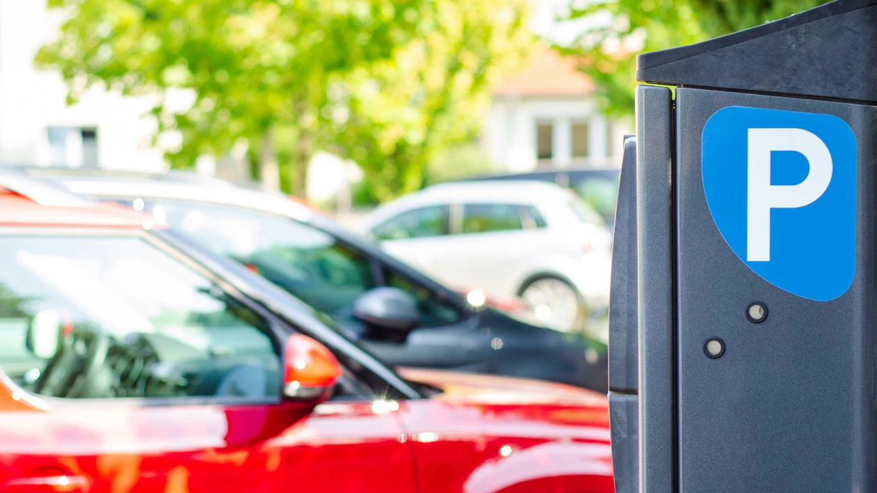Machine parking on a city street.