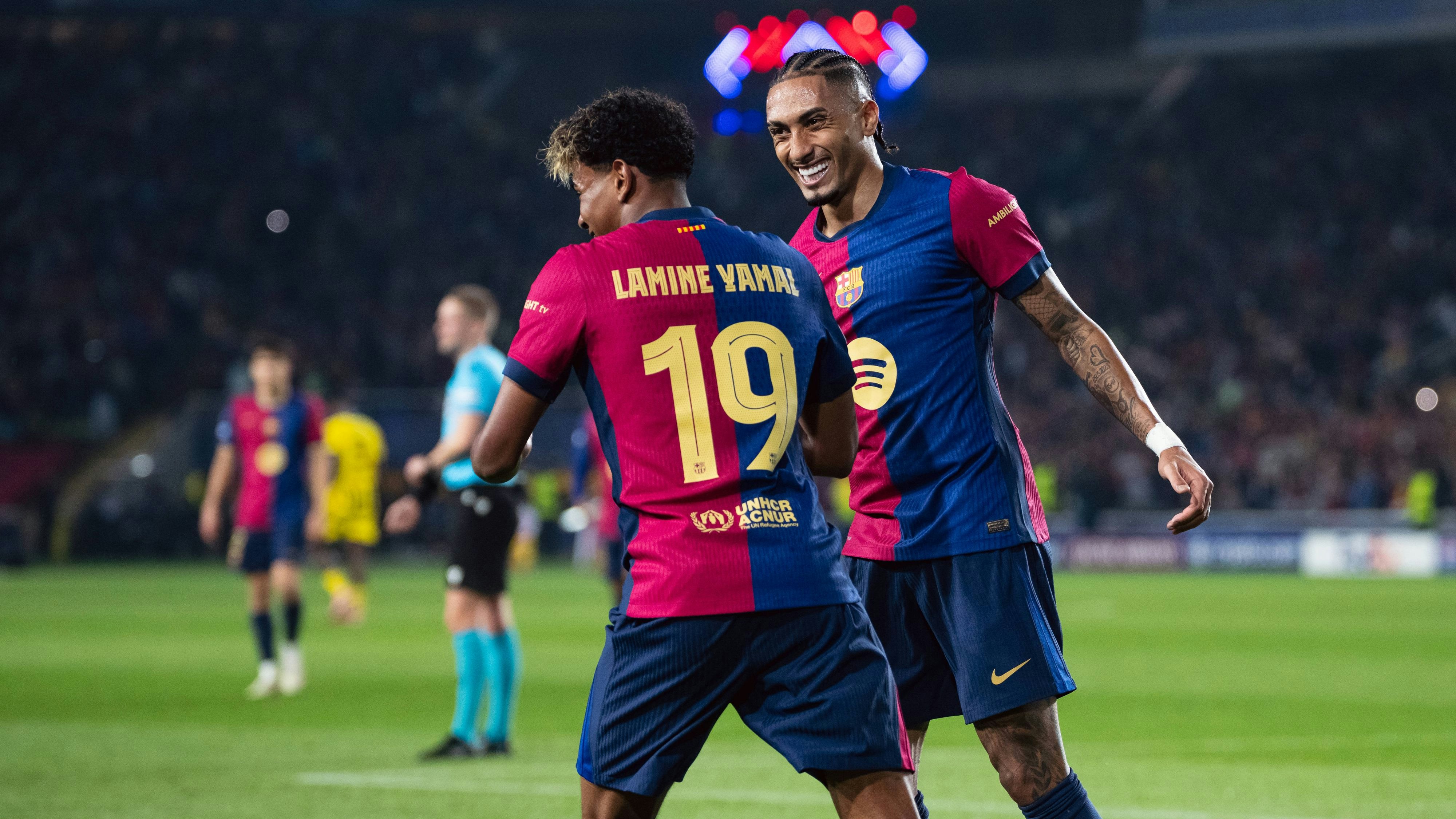 Spain-Football-Champions League - Quarters of Final First Leg - FC Barcelona, Barca v Borussia Dortmund in Barcelona, Spain. Barcelona, Spain, 9, April, 2025. Spain-Football-Champions League - Quarters of Final First Leg - FC Barcelona v Borussia Dortmund. 19 Lamine Yamal celebrates with 11 Raphinha the score of 9 Robert Lewandowski. Barcelona Olympic Stadium Lluis Companys Barcelona Spain