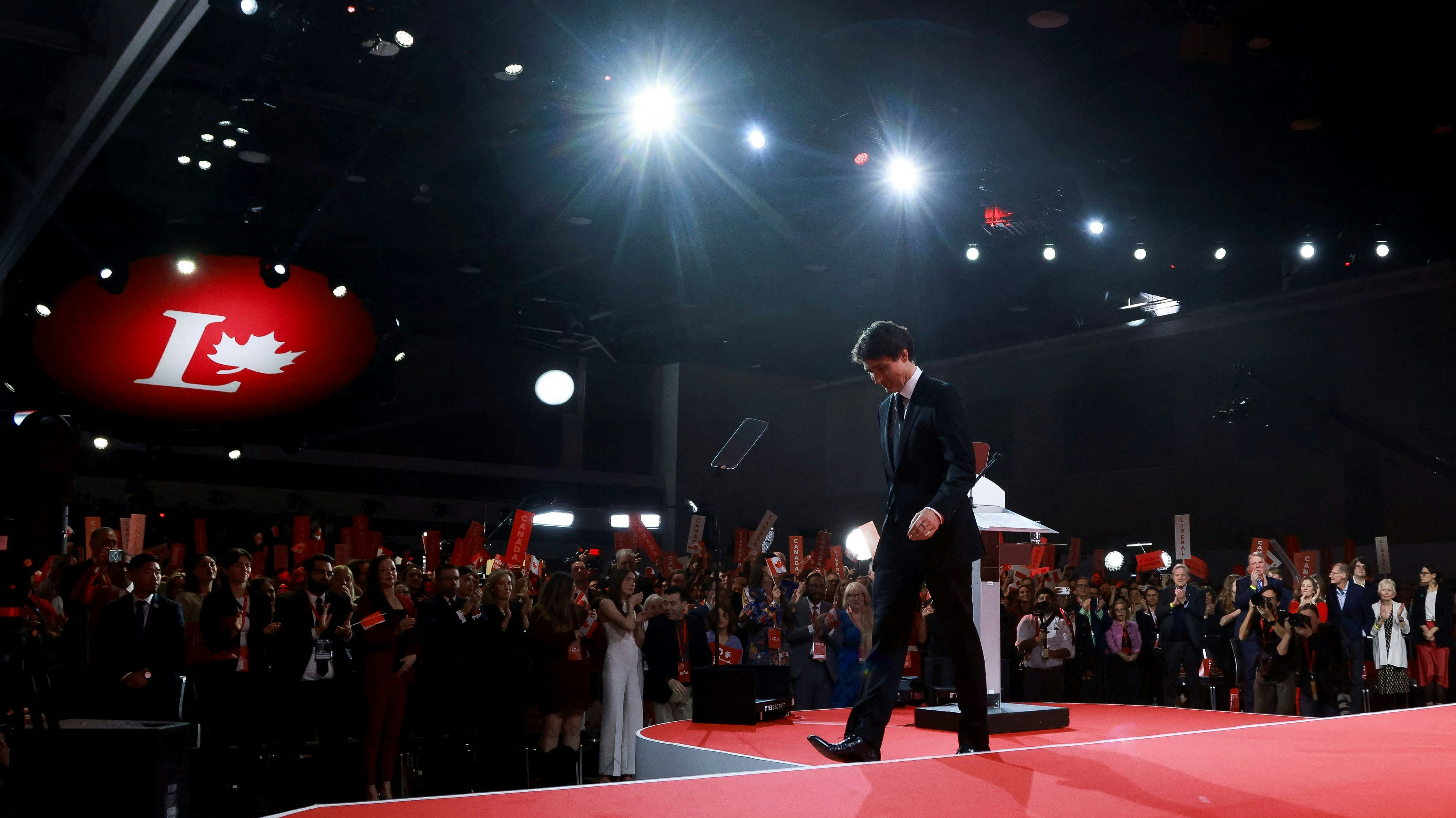 Prime Minister Justin Trudeau walks as members of Canada's Liberal Party gather to choose his successor, in Ottawa, Ontario, Canada March 9, 2025. REUTERS/Carlos Osorio/Pool  