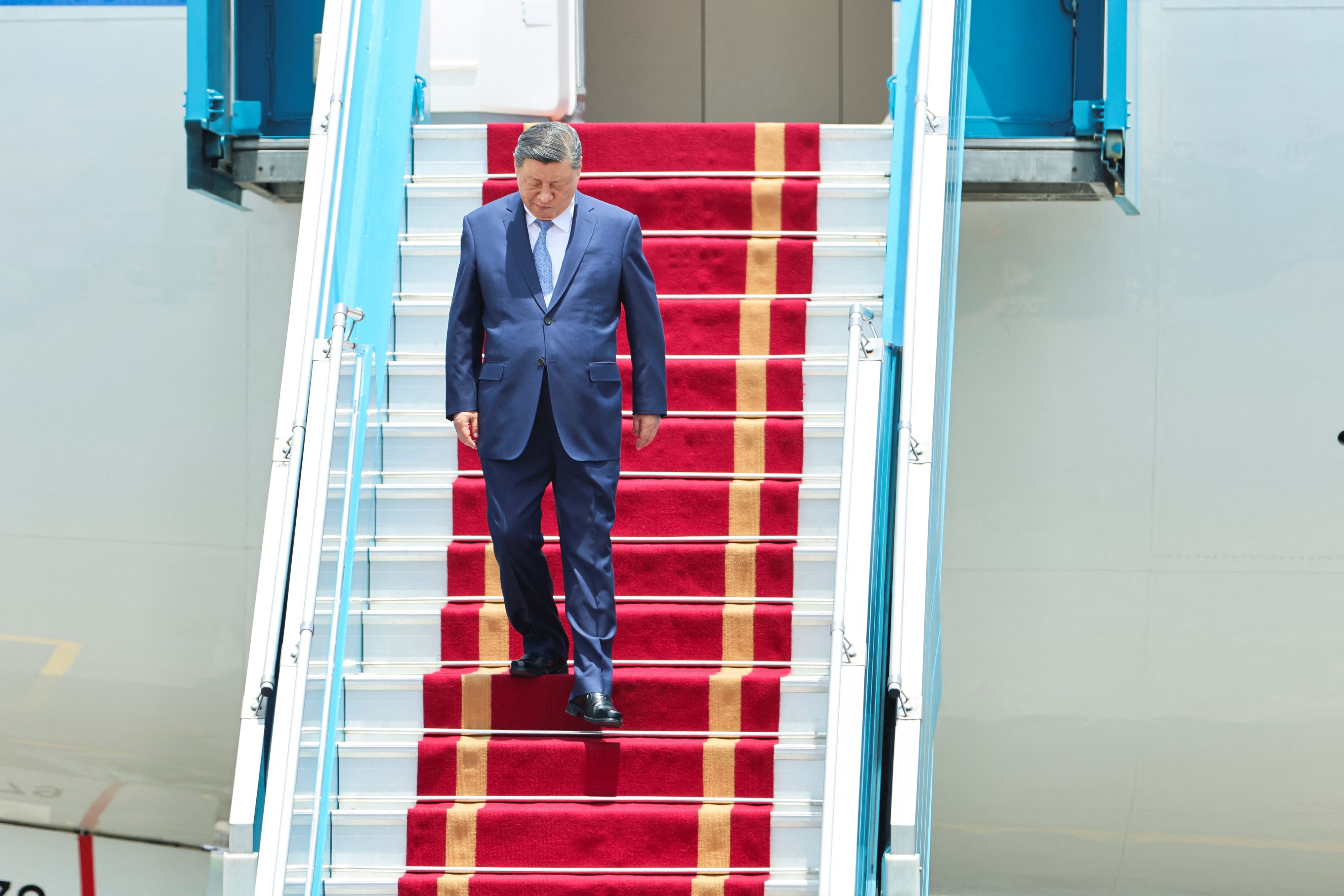 Chinas Staatspräsident Xi Jinping arbeitete über Zusammenschlüsse wie die Shanghaier Organisation zur Zusammenarbeit an der Weltherrschaft