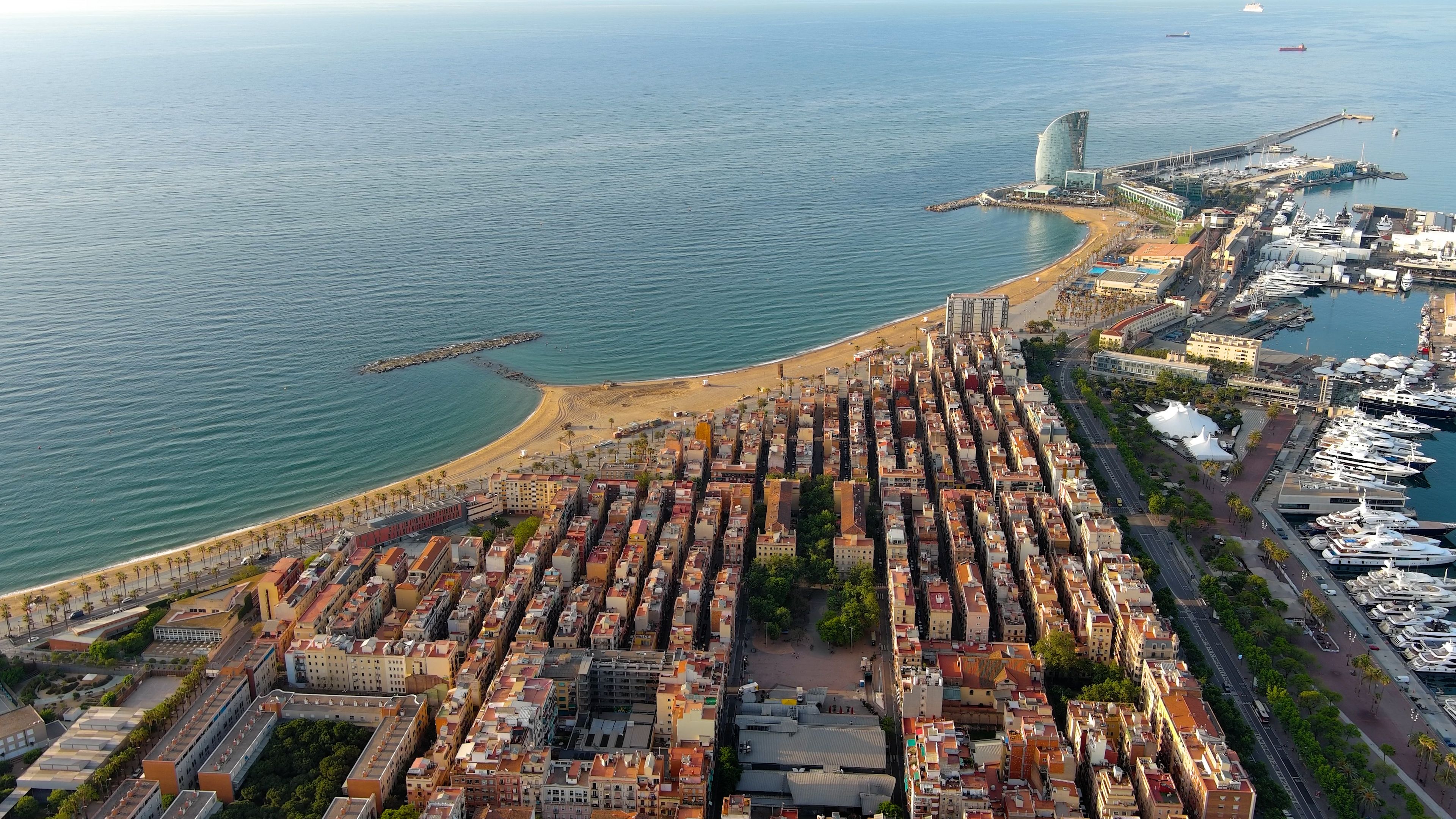 Aerial video of downtown Barcelona in Catalonia, Spain on a beautiful sunny day.