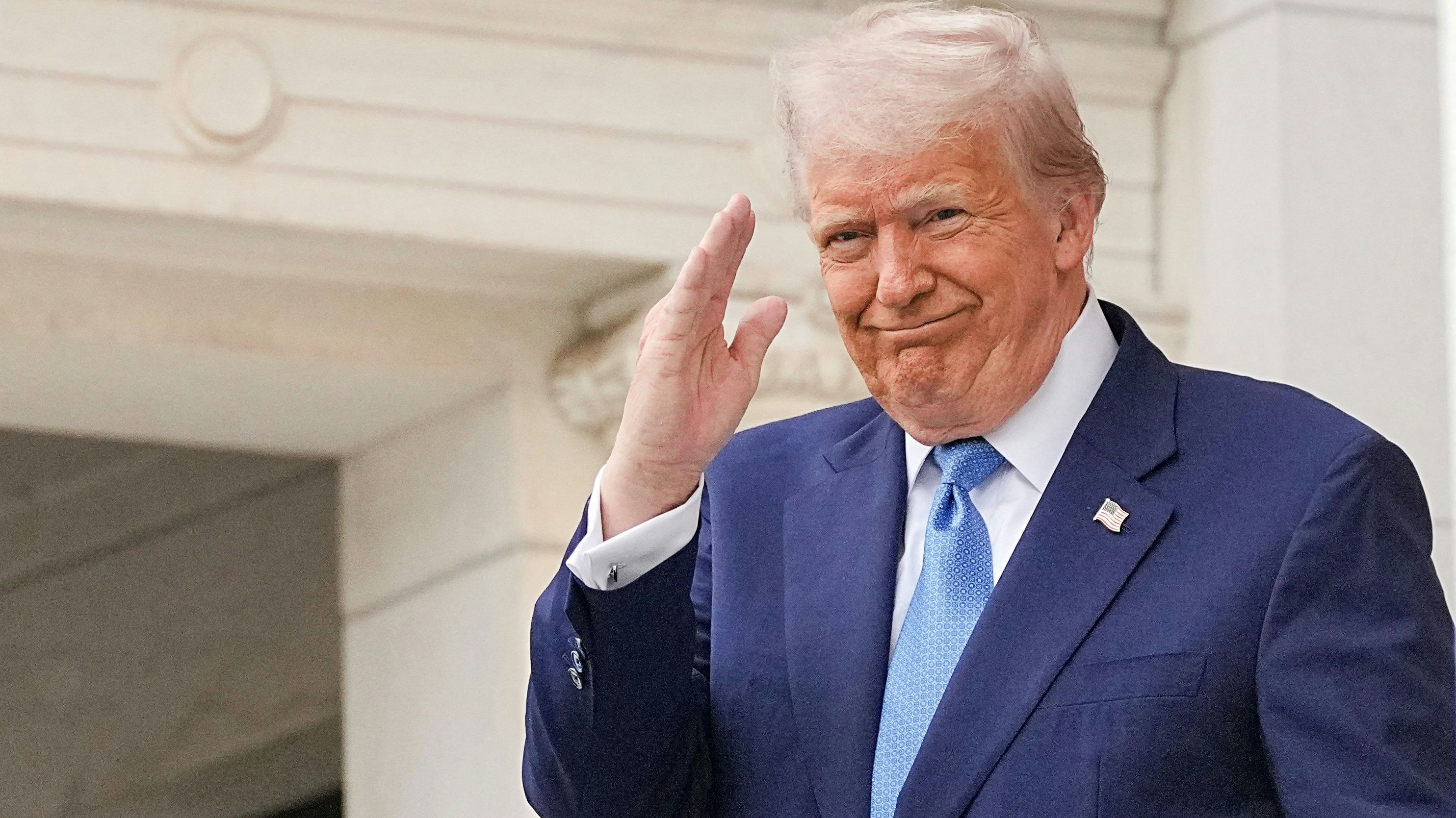 U.S. President Donald Trump salutes, during the annual National Memorial Day Observance in the Memorial Amphitheater, at Arlington National Cemetery in Arlington, Virginia, U.S., May 26, 2025. REUTERS/Ken Cedeno