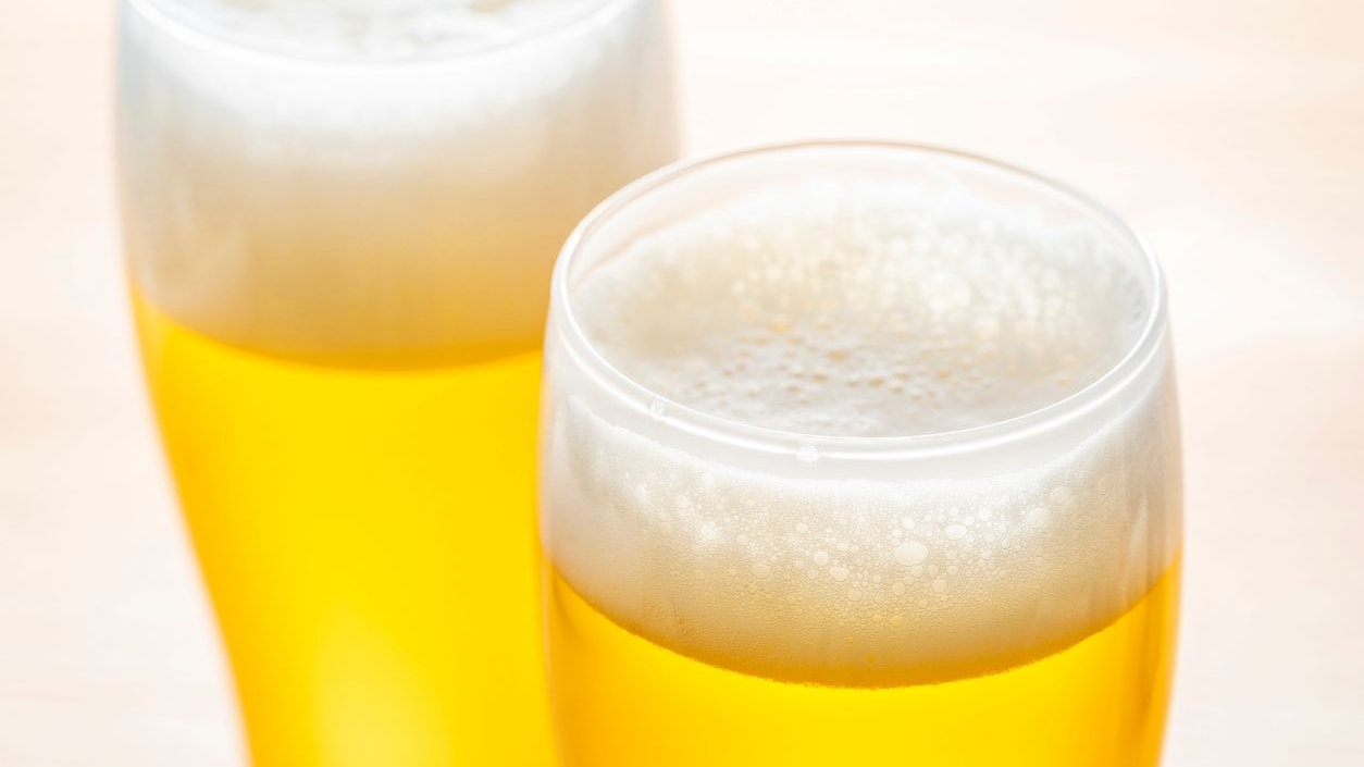 Pour beer into a glass