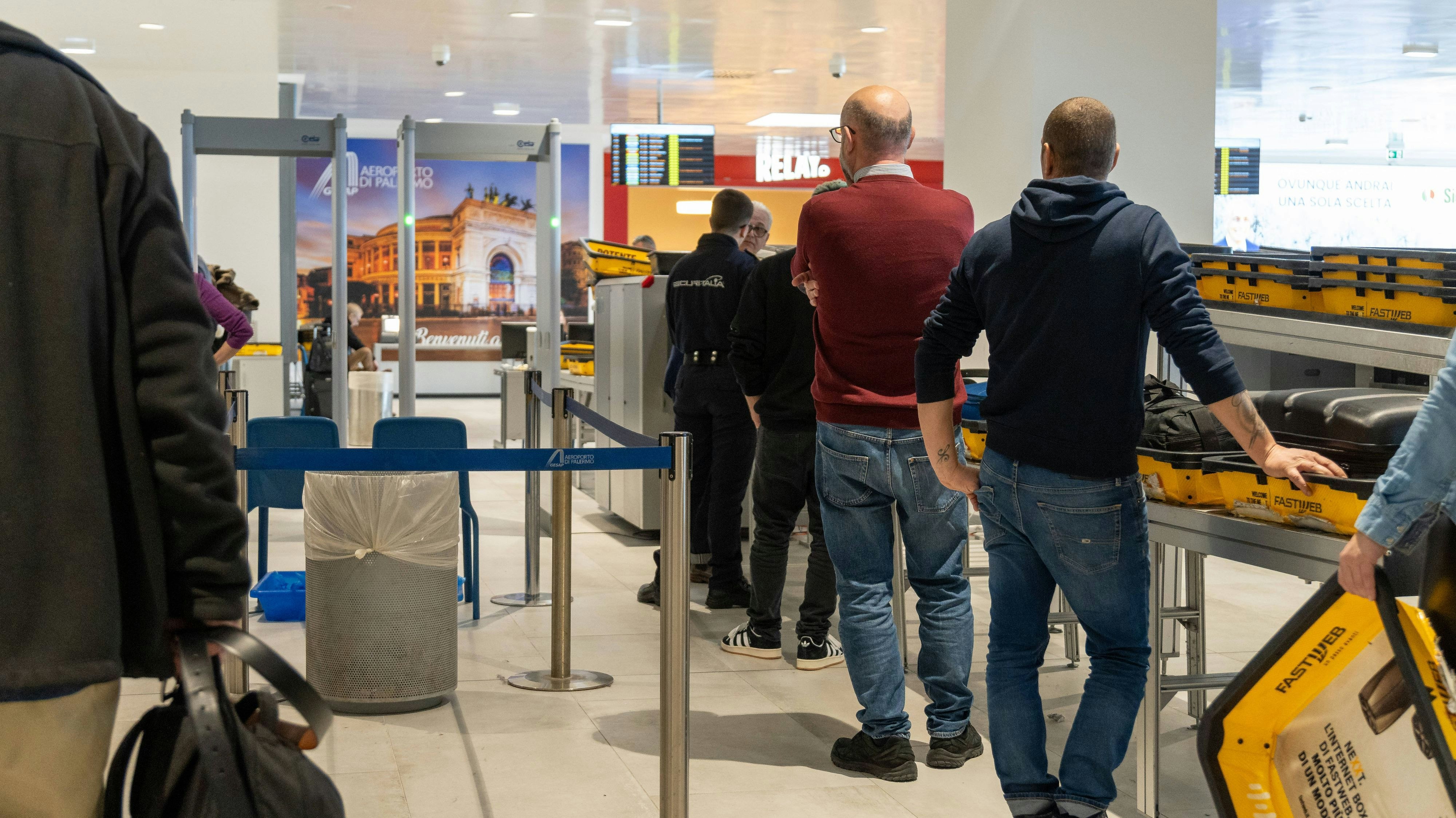 Palermo, Italy - March 4, 2024: Security check at the airport *** Sicherheitskontrolle am Flughafen