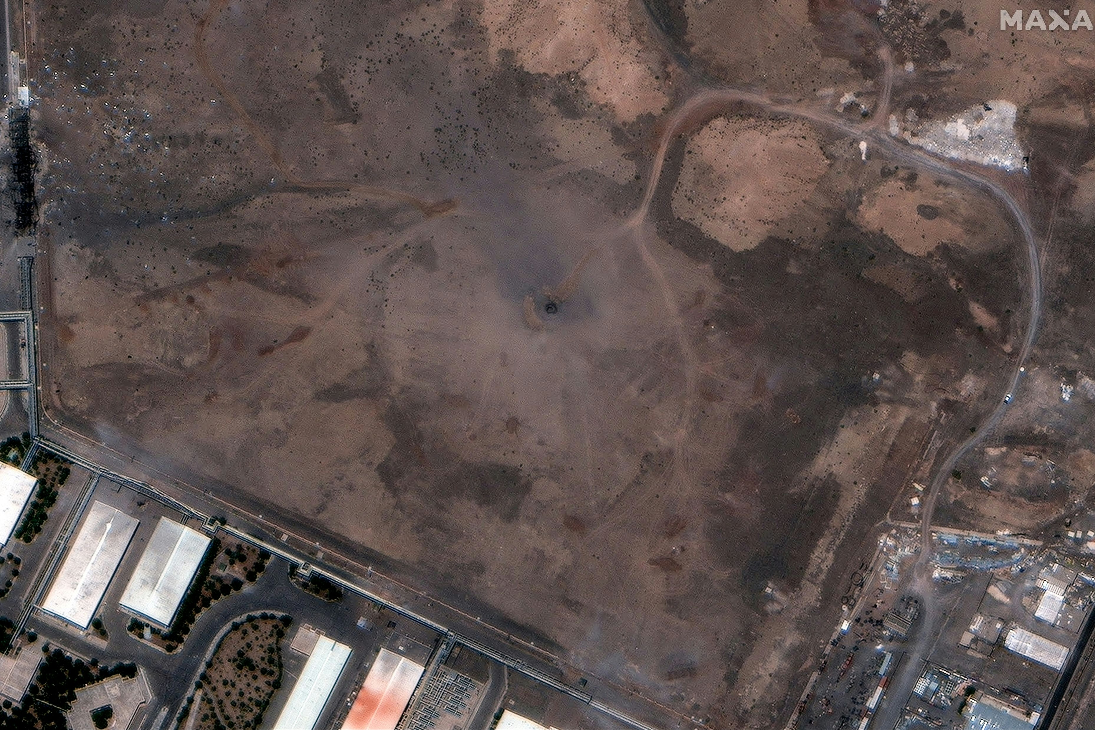 Das Satellitenbild zeigt einen Krater über der unterirdischen Anlage der Natanz-Nuklearanlage nach dem US-Angriff
