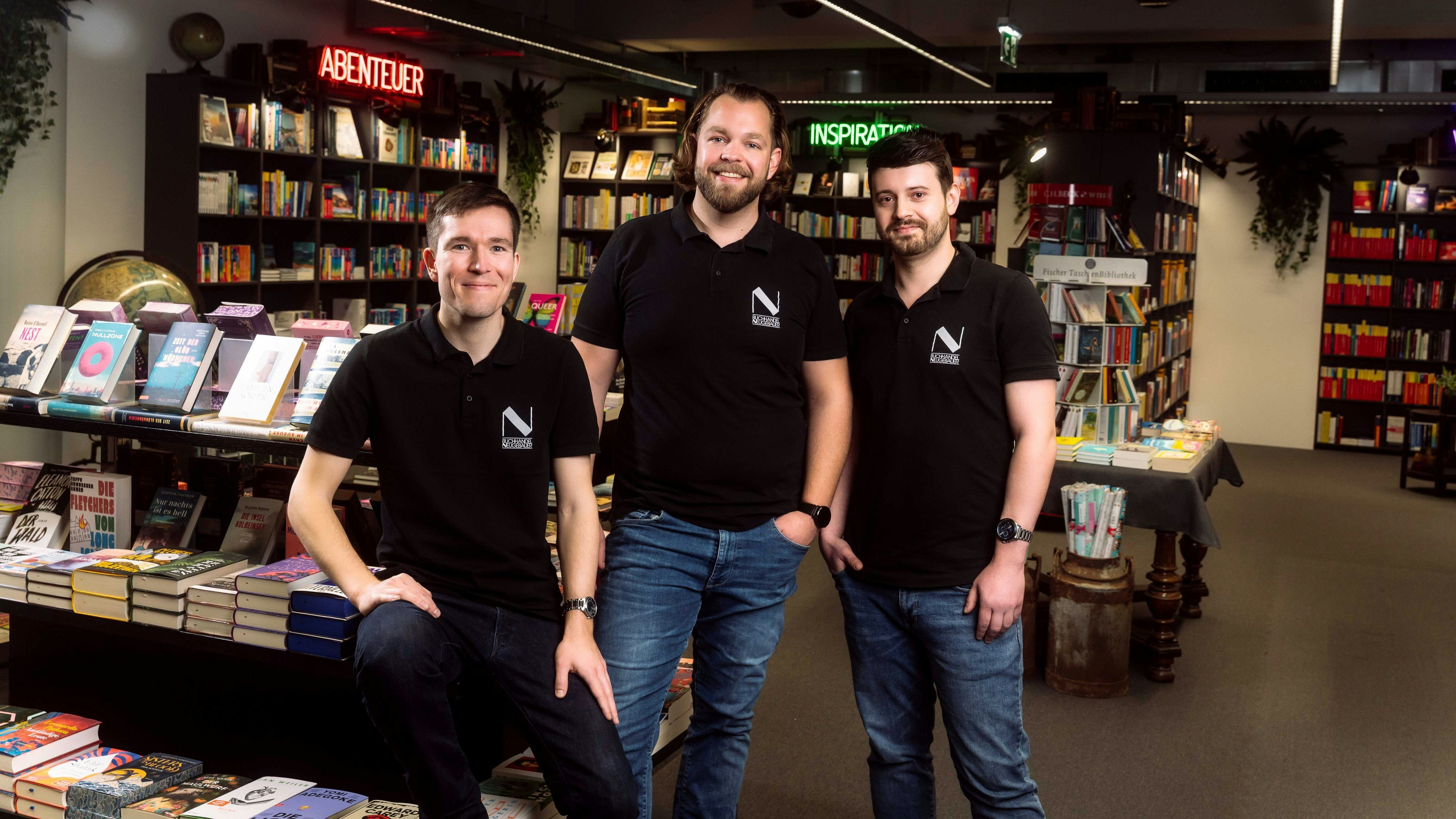 Kevin Coder (Mi.) mit seinen Mitarbeitern.