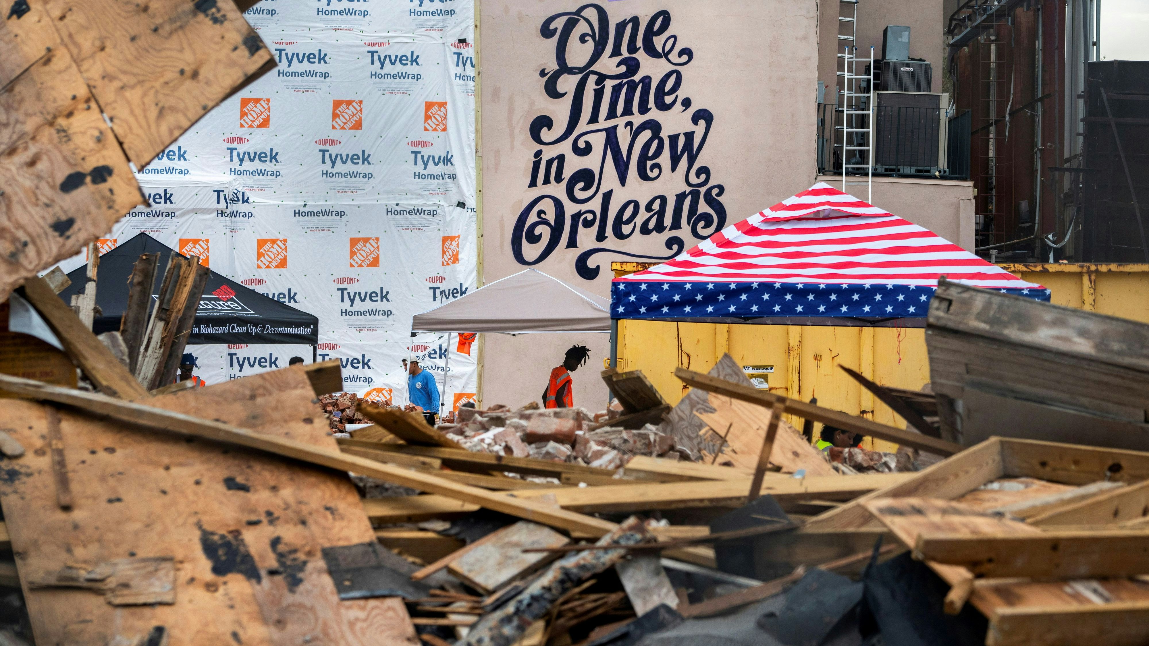 Workers clean up the site of the Historic Karnofsky Shop, a historic, building that collapsed during Hurricane Ida in New Orleans, Louisiana, U.S., September 6, 2021. REUTERS/Kathleen Flynn     TPX IMAGES OF THE DAY