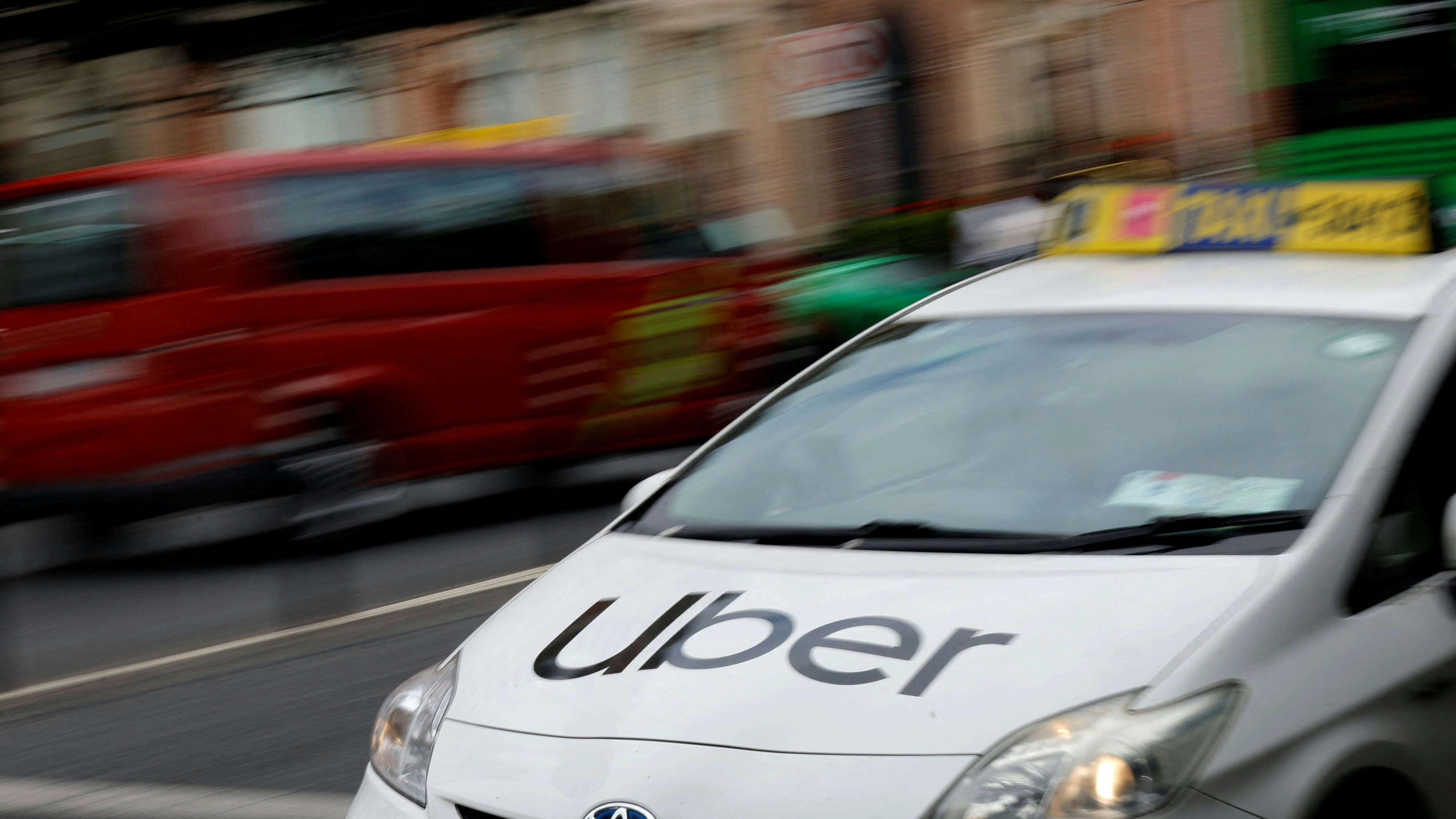 An Uber logo is seen on the bonnet of a taxi, in Dublin, Ireland, June 29, 2025. REUTERS/Clodagh Kilcoyne